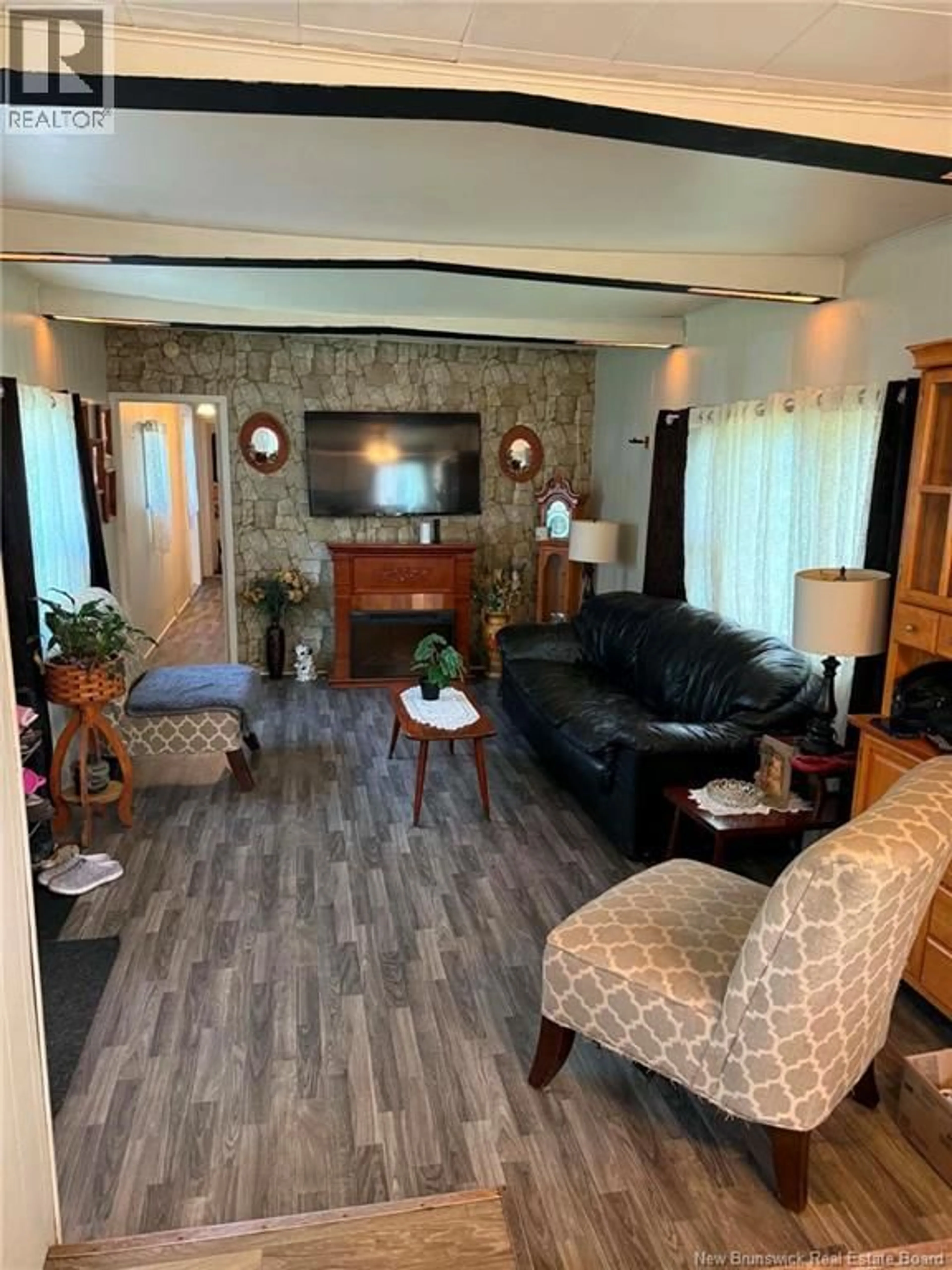 Living room with furniture, wood/laminate floor for 37 BRADD STREET, Miramichi New Brunswick E1N2A8