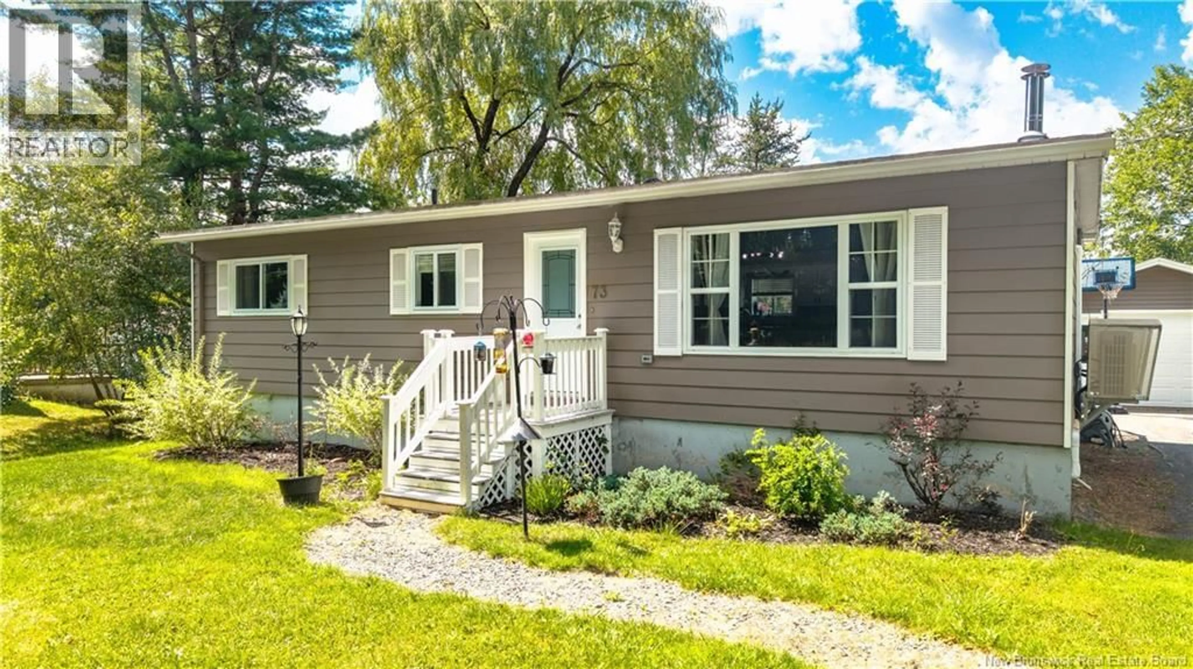 Home with vinyl exterior material, street for 73 HAWTHORNE STREET, St. Stephen New Brunswick E3L1W7