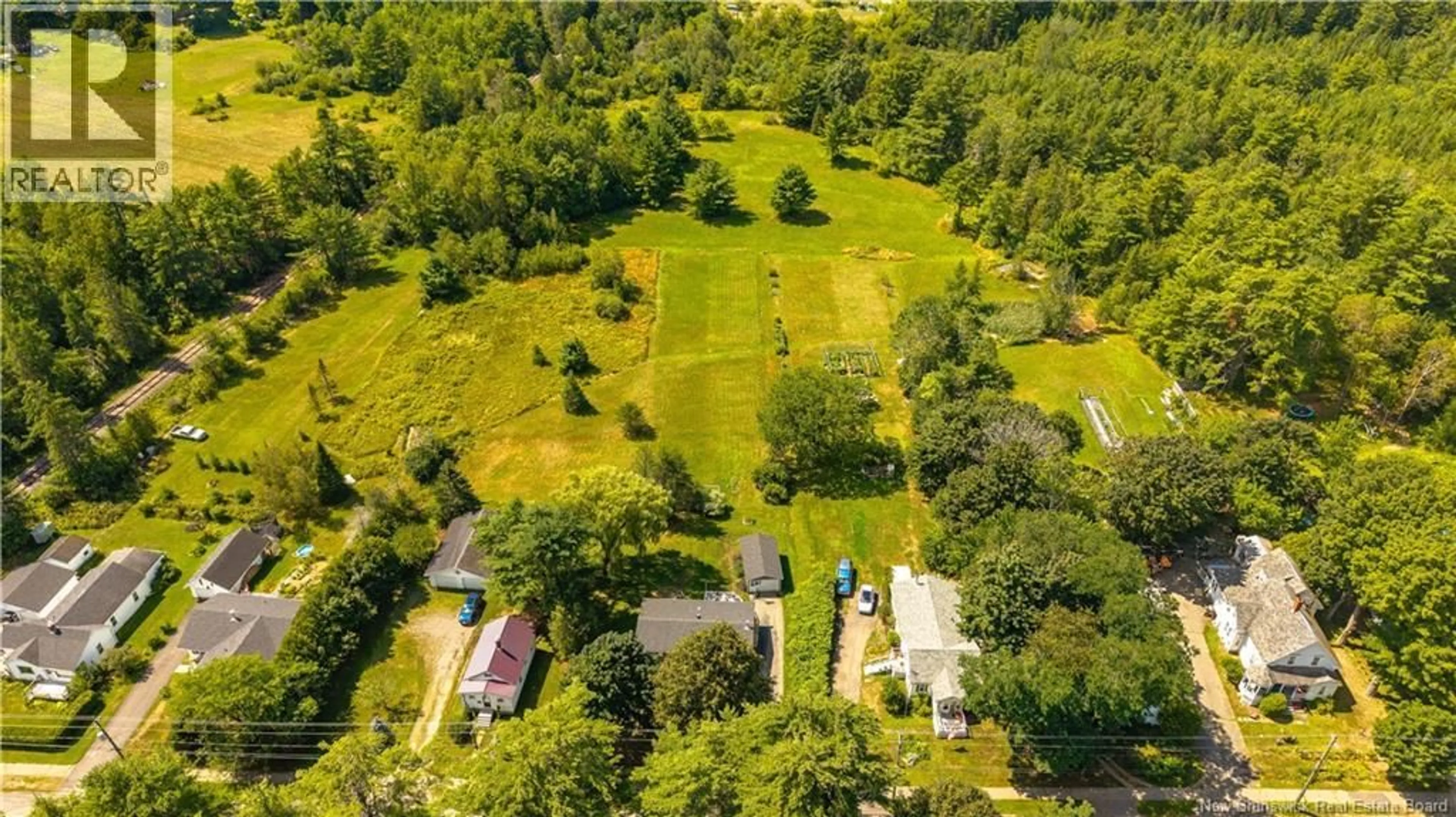 A pic from outside/outdoor area/front of a property/back of a property/a pic from drone, unknown for 73 HAWTHORNE STREET, St. Stephen New Brunswick E3L1W7