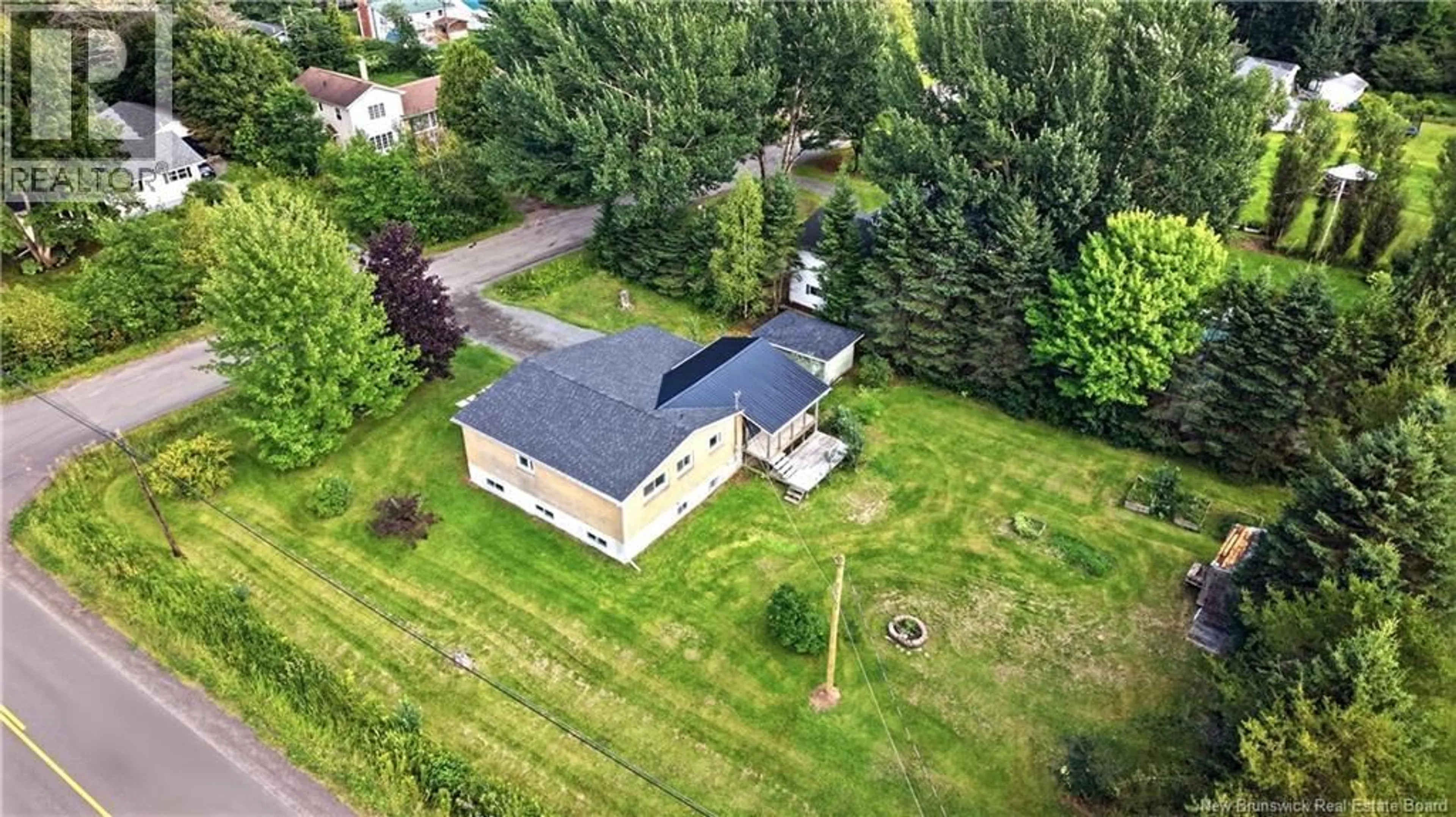 A pic from outside/outdoor area/front of a property/back of a property/a pic from drone, unknown for 3 THOMSON DRIVE, Allison New Brunswick E1G4G9