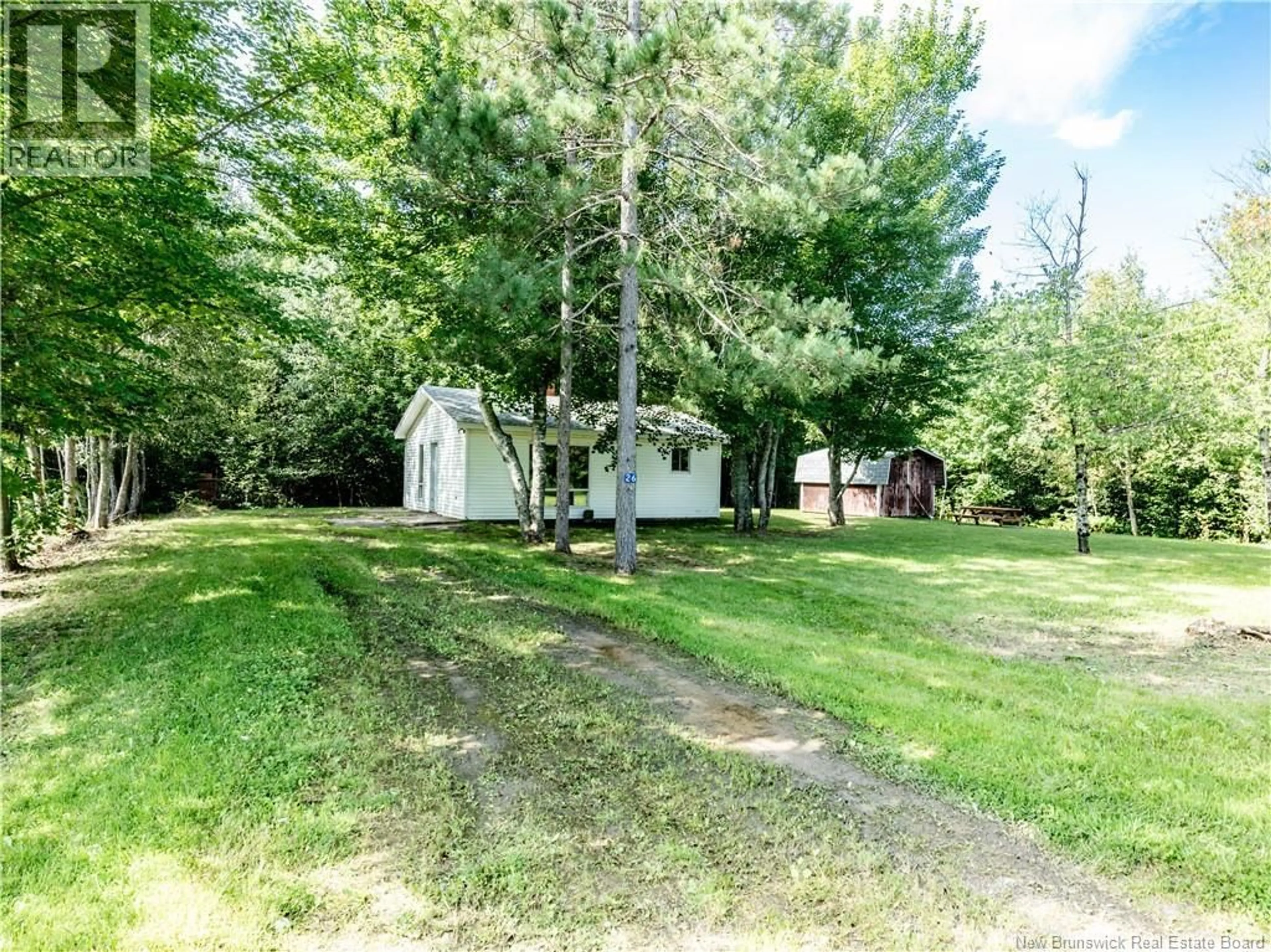 A pic from outside/outdoor area/front of a property/back of a property/a pic from drone, forest/trees view for 26 DES ERABLES, Grand-Barachois New Brunswick E4P7G6