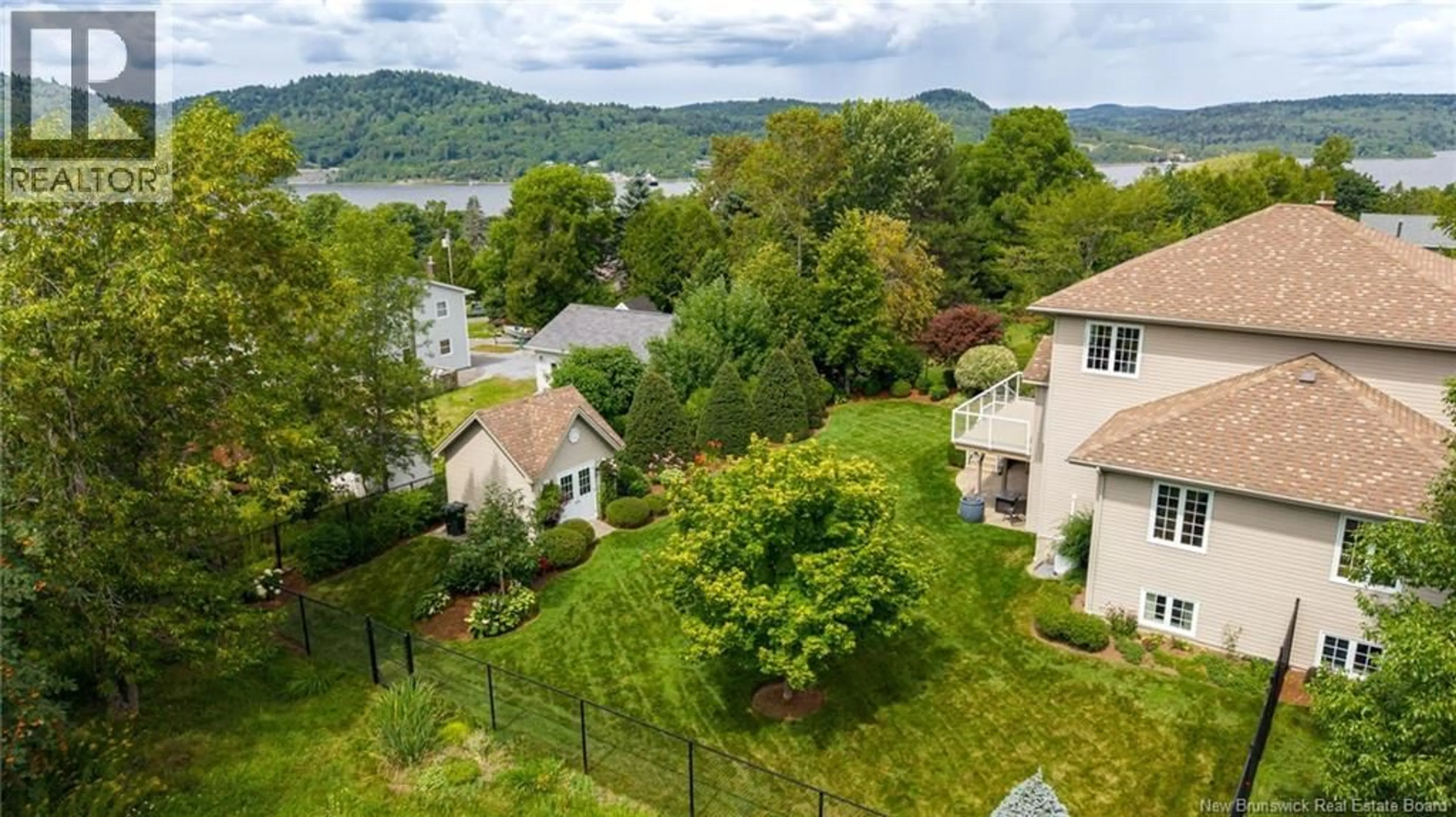A pic from outside/outdoor area/front of a property/back of a property/a pic from drone, water/lake/river/ocean view for 8 AARON AVENUE, Quispamsis New Brunswick E2E5B7
