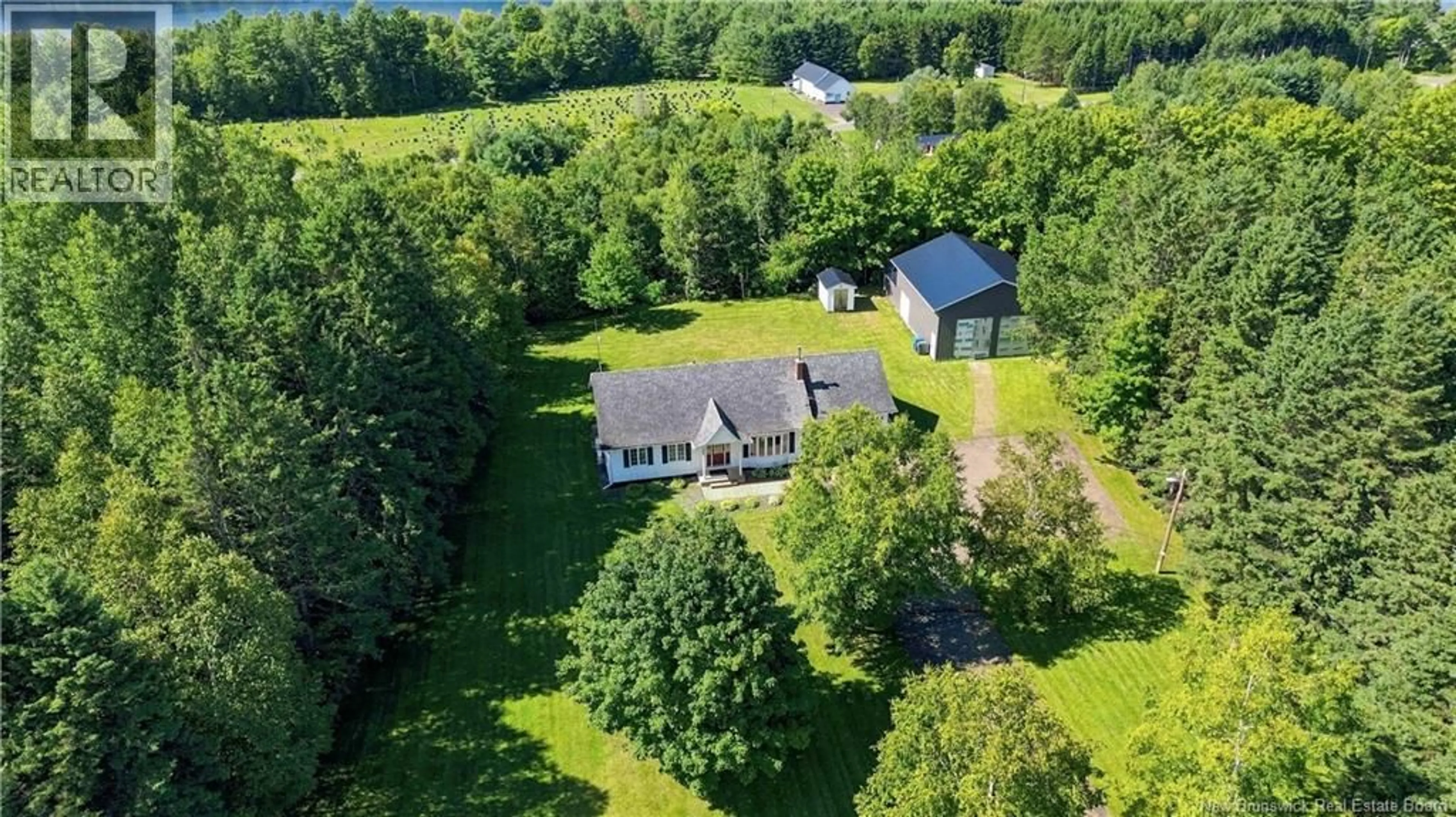A pic from outside/outdoor area/front of a property/back of a property/a pic from drone, water/lake/river/ocean view for 10501 ROUTE 105, Upper Kent New Brunswick E7J2B5