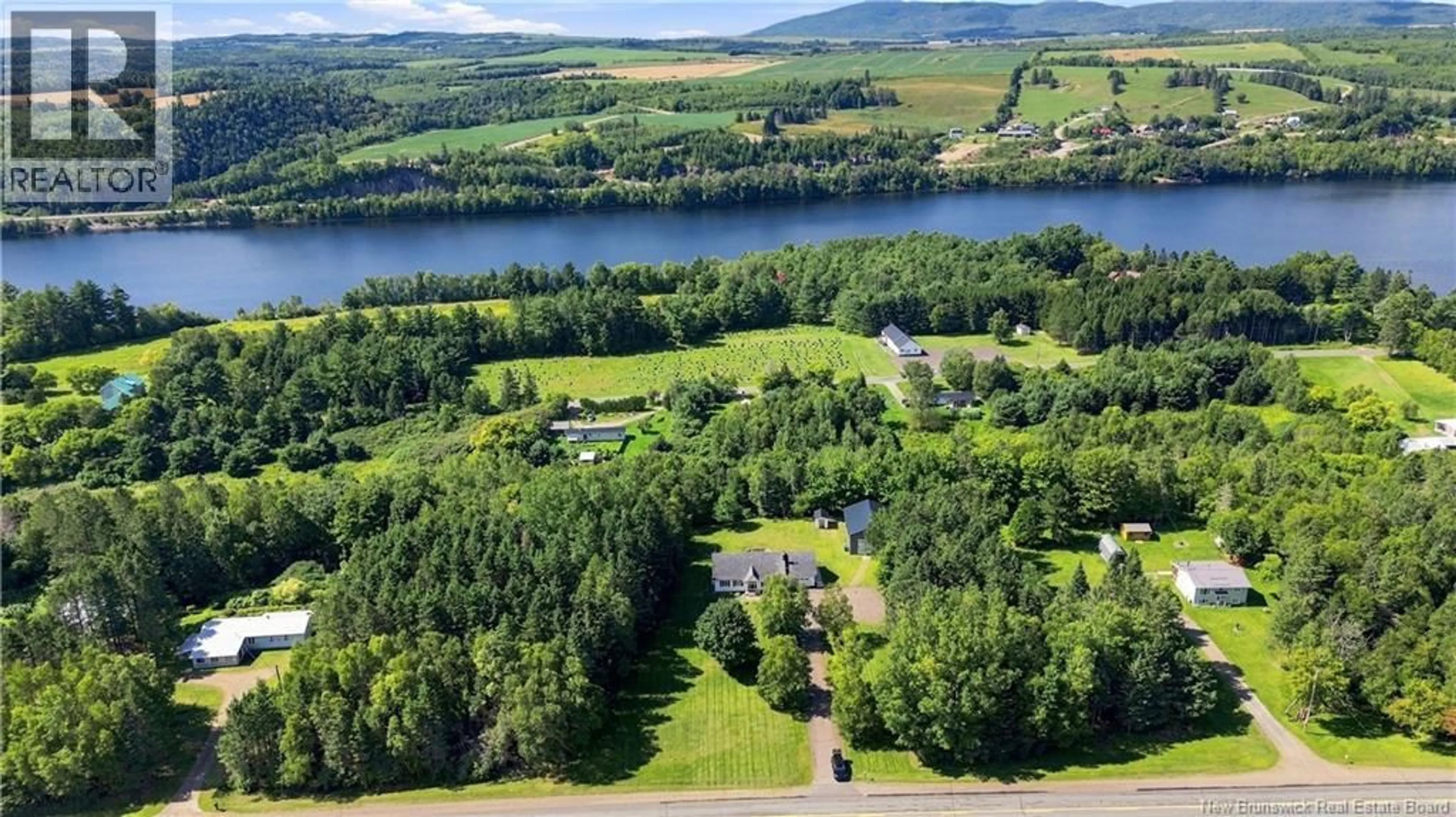 A pic from outside/outdoor area/front of a property/back of a property/a pic from drone, water/lake/river/ocean view for 10501 ROUTE 105, Upper Kent New Brunswick E7J2B5
