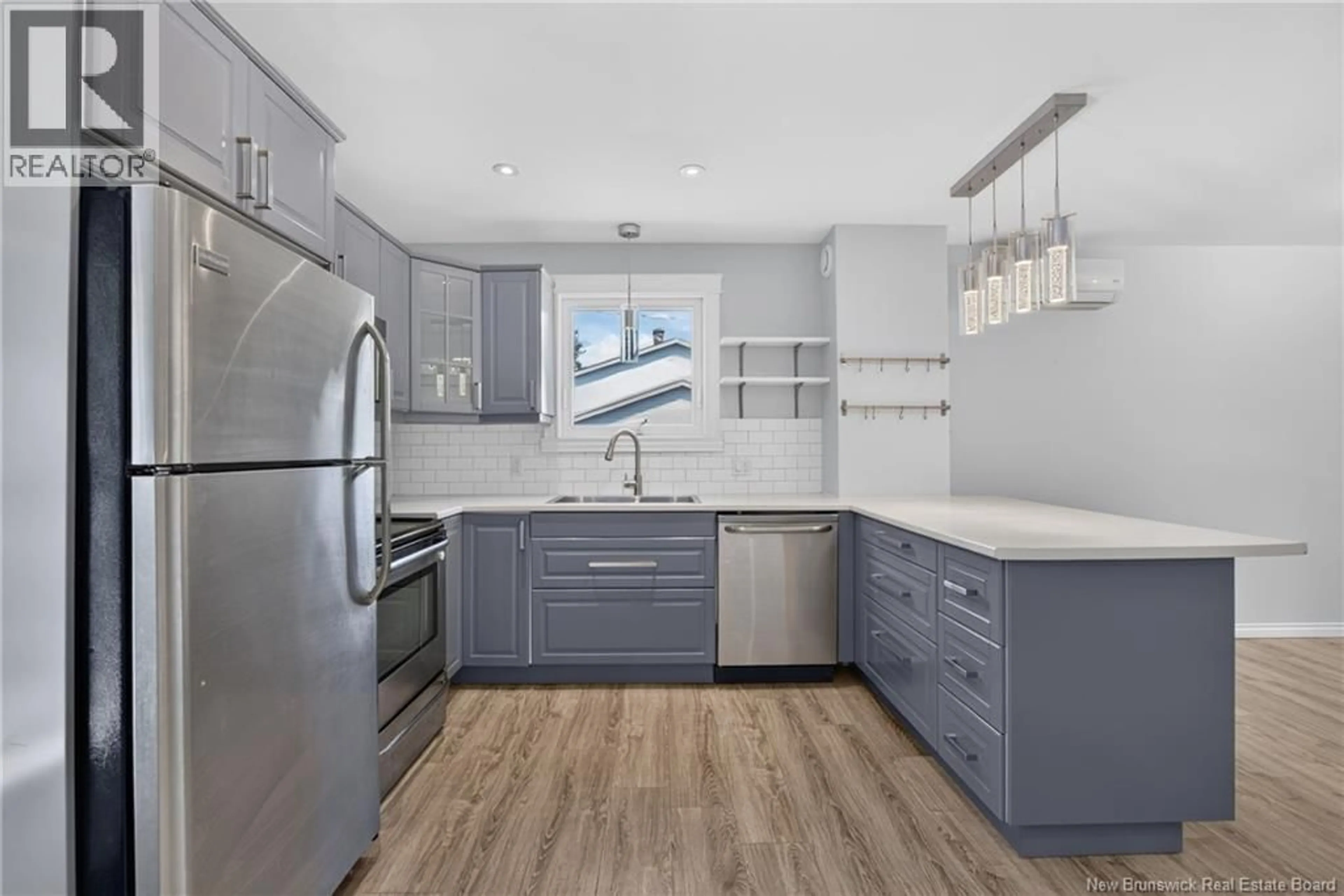 Open concept kitchen, ceramic/tile floor for 880 GLENGARRY PLACE, Fredericton New Brunswick E3B5Z9