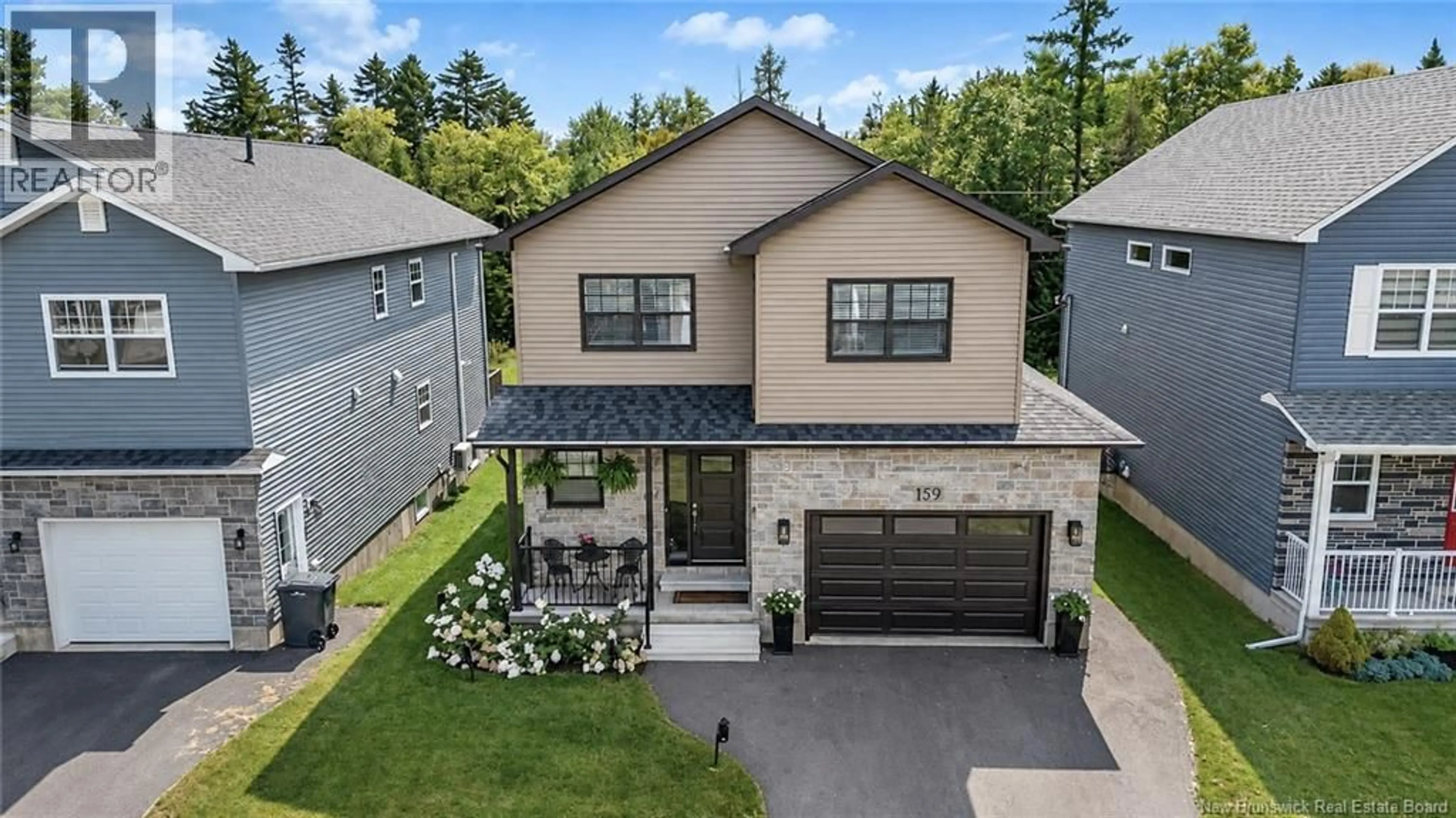 A pic from outside/outdoor area/front of a property/back of a property/a pic from drone, street for 159 BRAMBLE WAY, Fredericton New Brunswick E3G0C8