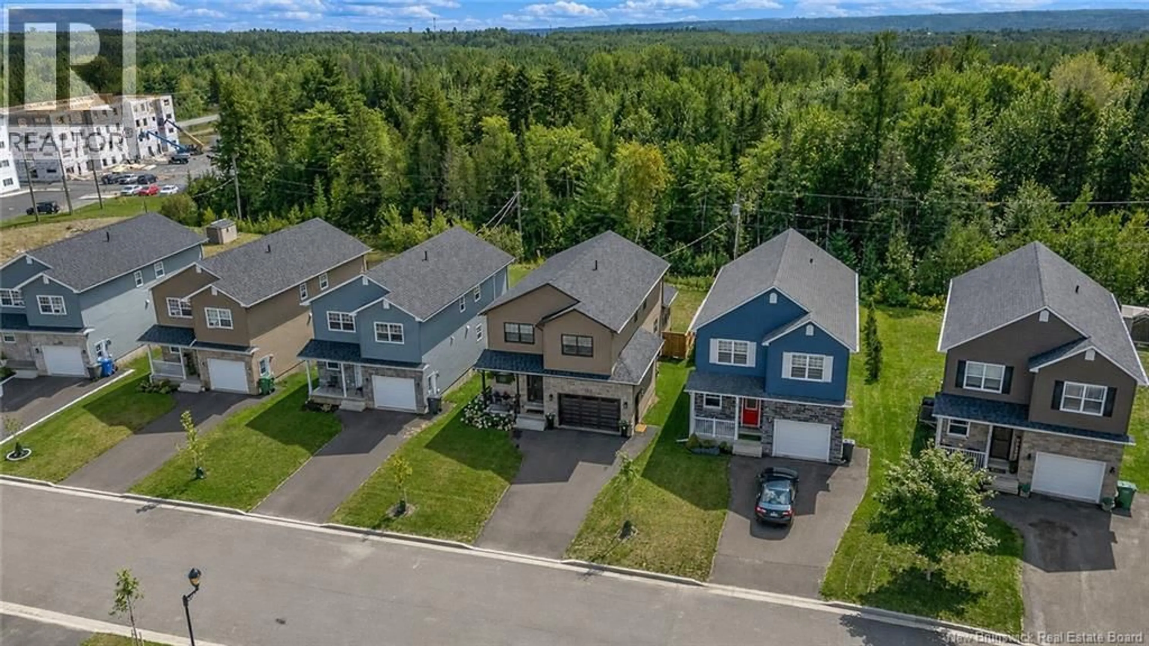 A pic from outside/outdoor area/front of a property/back of a property/a pic from drone, street for 159 BRAMBLE WAY, Fredericton New Brunswick E3G0C8