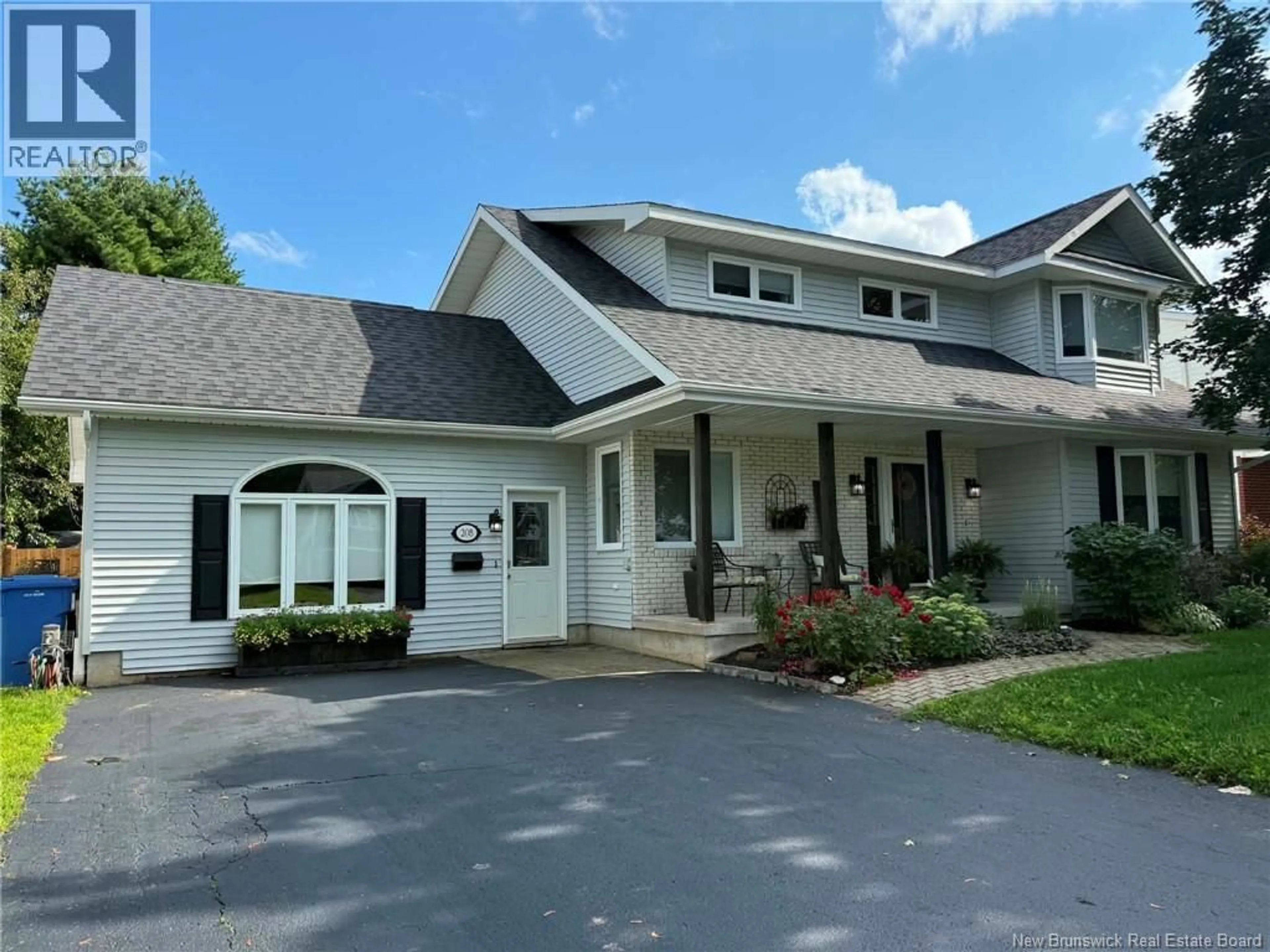 Home with vinyl exterior material, street for 208 CLAIRE AVENUE, Miramichi New Brunswick E1V3X4