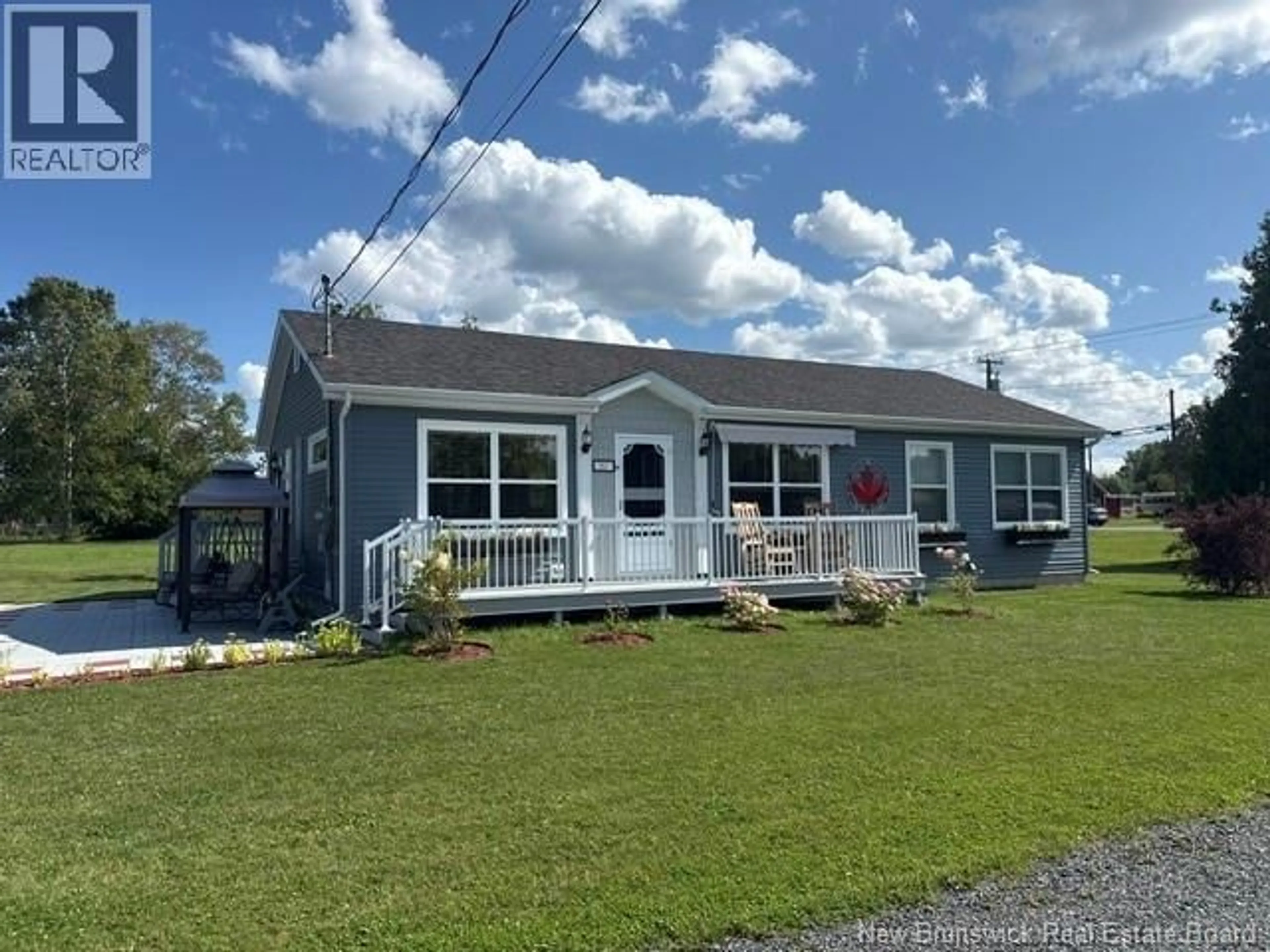 Home with vinyl exterior material, street for 557 CHALEUR STREET, Charlo New Brunswick E8E2C6