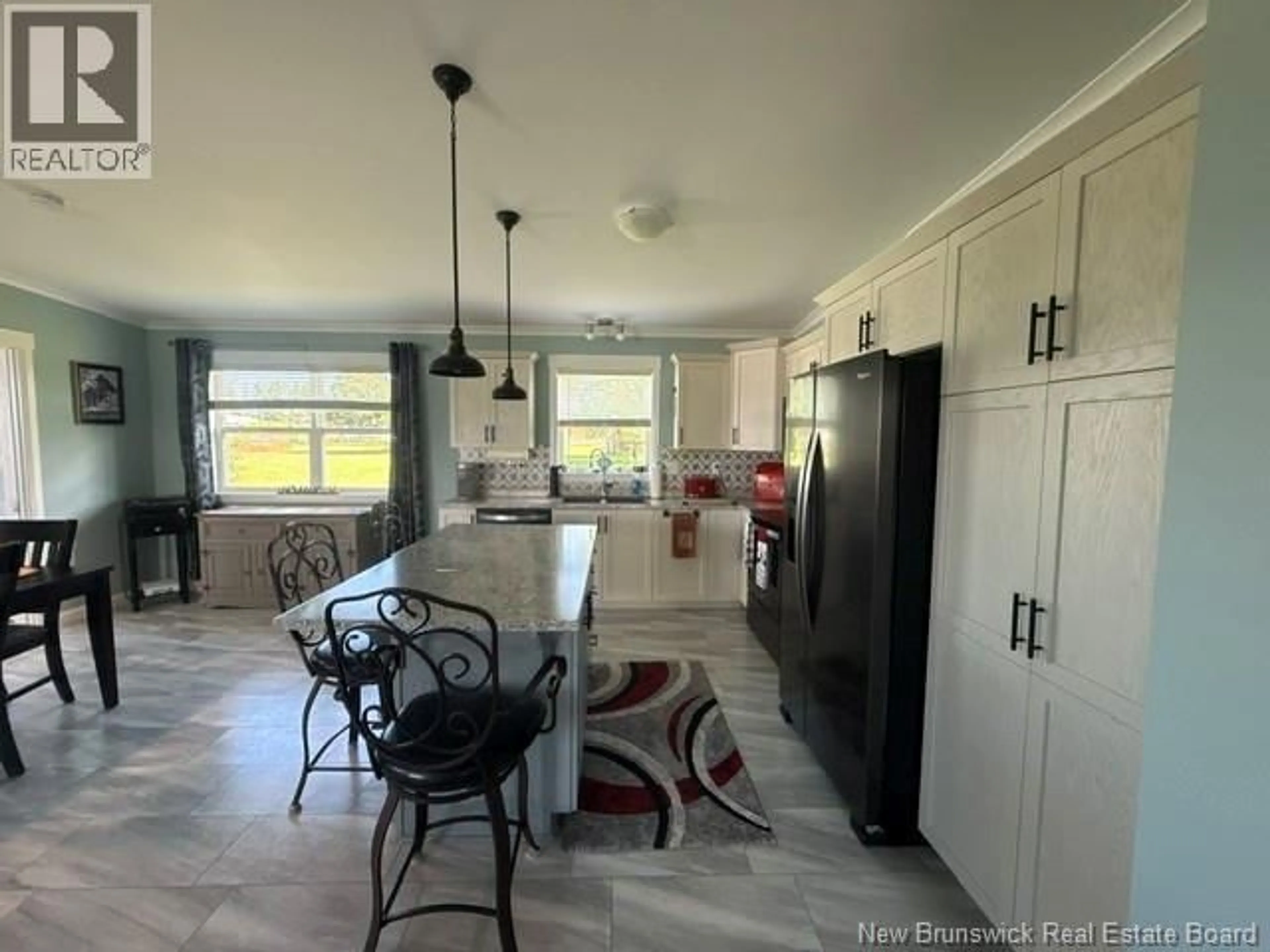 Open concept kitchen, ceramic/tile floor for 557 CHALEUR STREET, Charlo New Brunswick E8E2C6