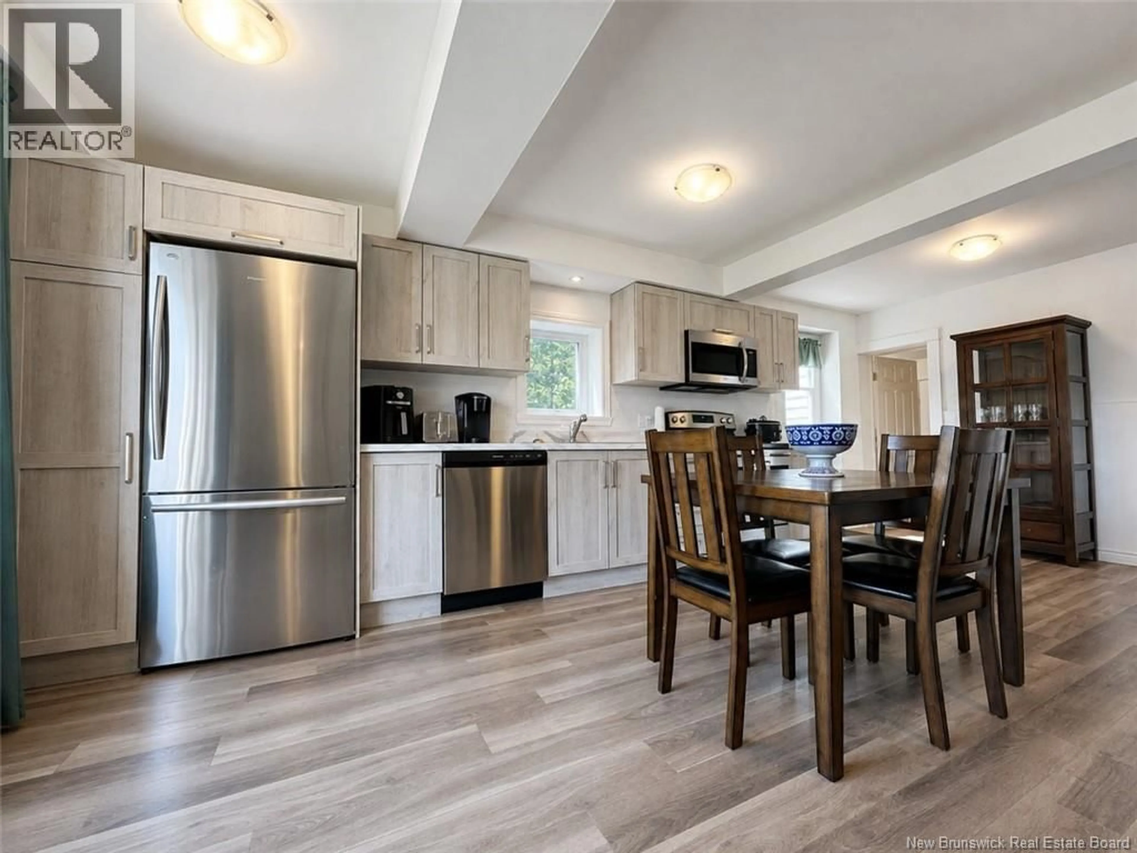 Open concept kitchen, wood/laminate floor for 94 PRINCIPALE STREET, Eel River Crossing New Brunswick E8E1T1