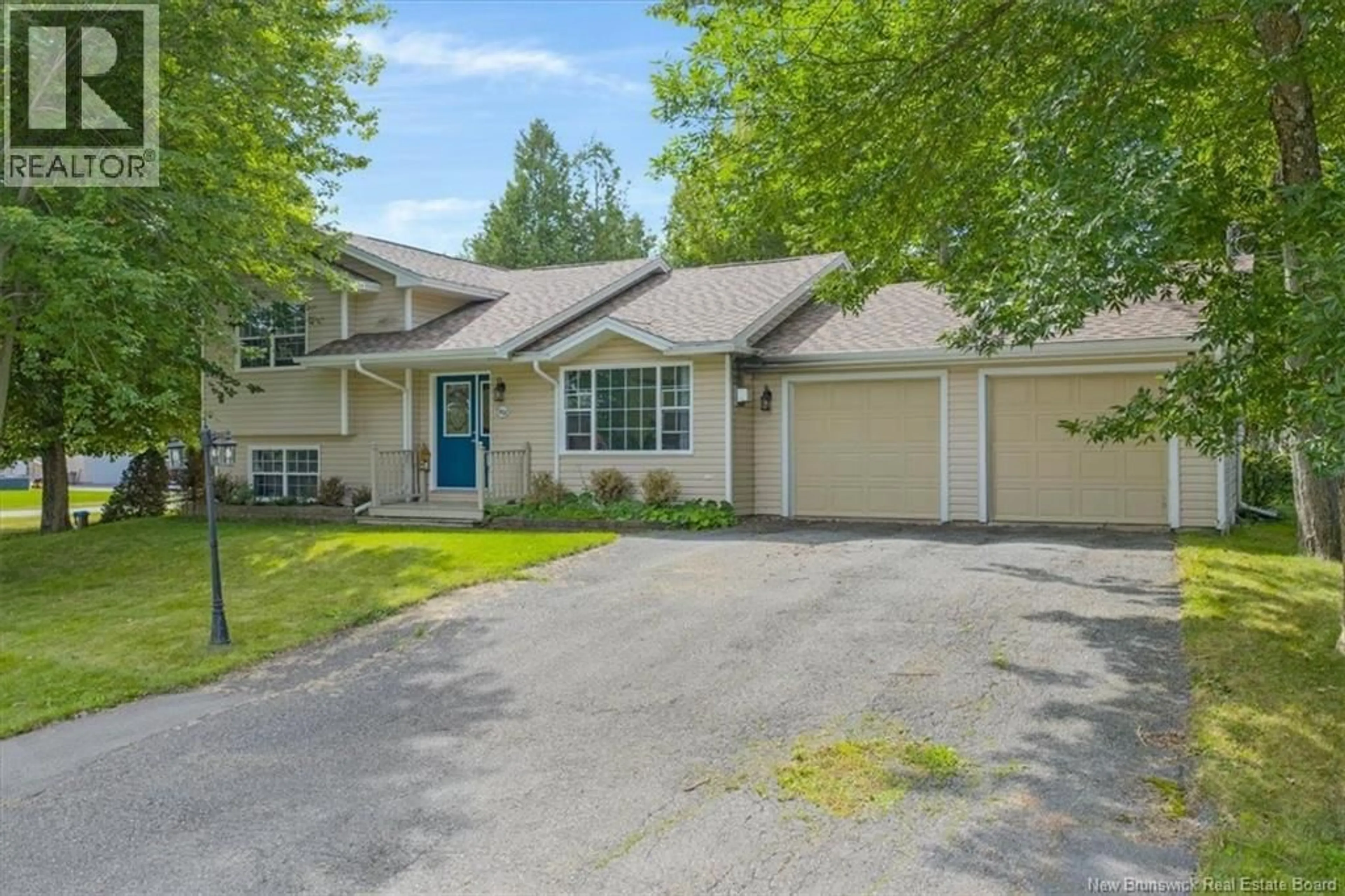 Home with vinyl exterior material, street for 1 TAGISH ROAD, Quispamsis New Brunswick E2E6C2