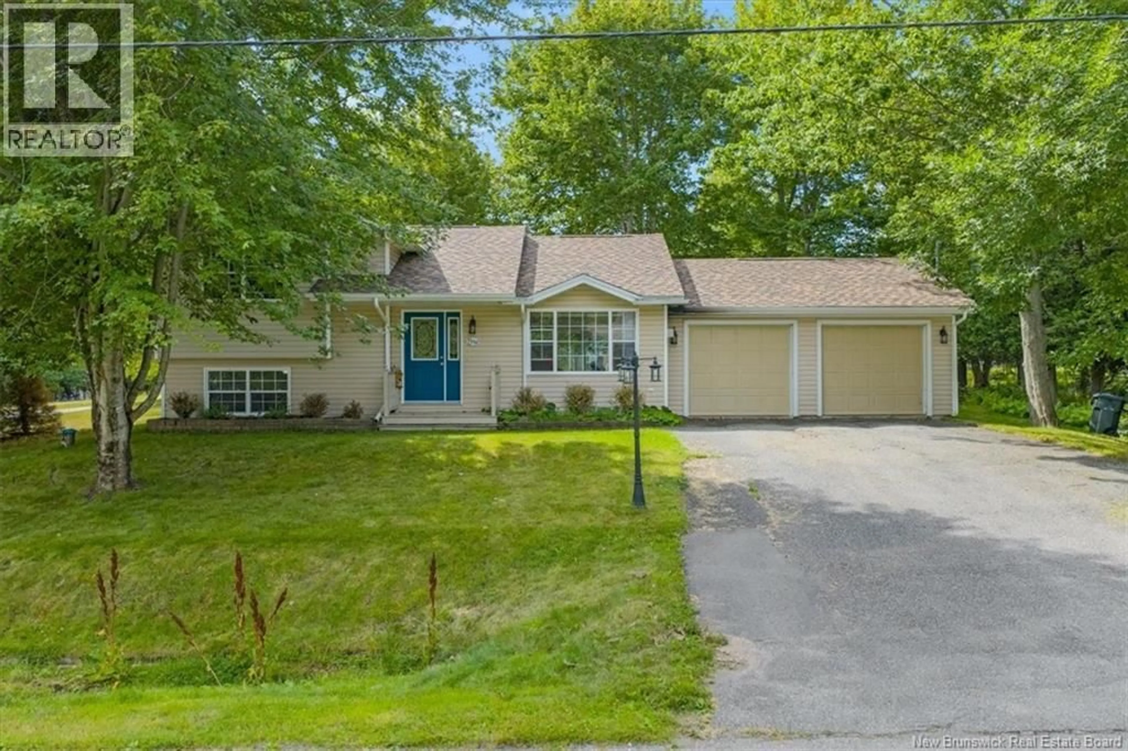 A pic from outside/outdoor area/front of a property/back of a property/a pic from drone, street for 1 TAGISH ROAD, Quispamsis New Brunswick E2E6C2