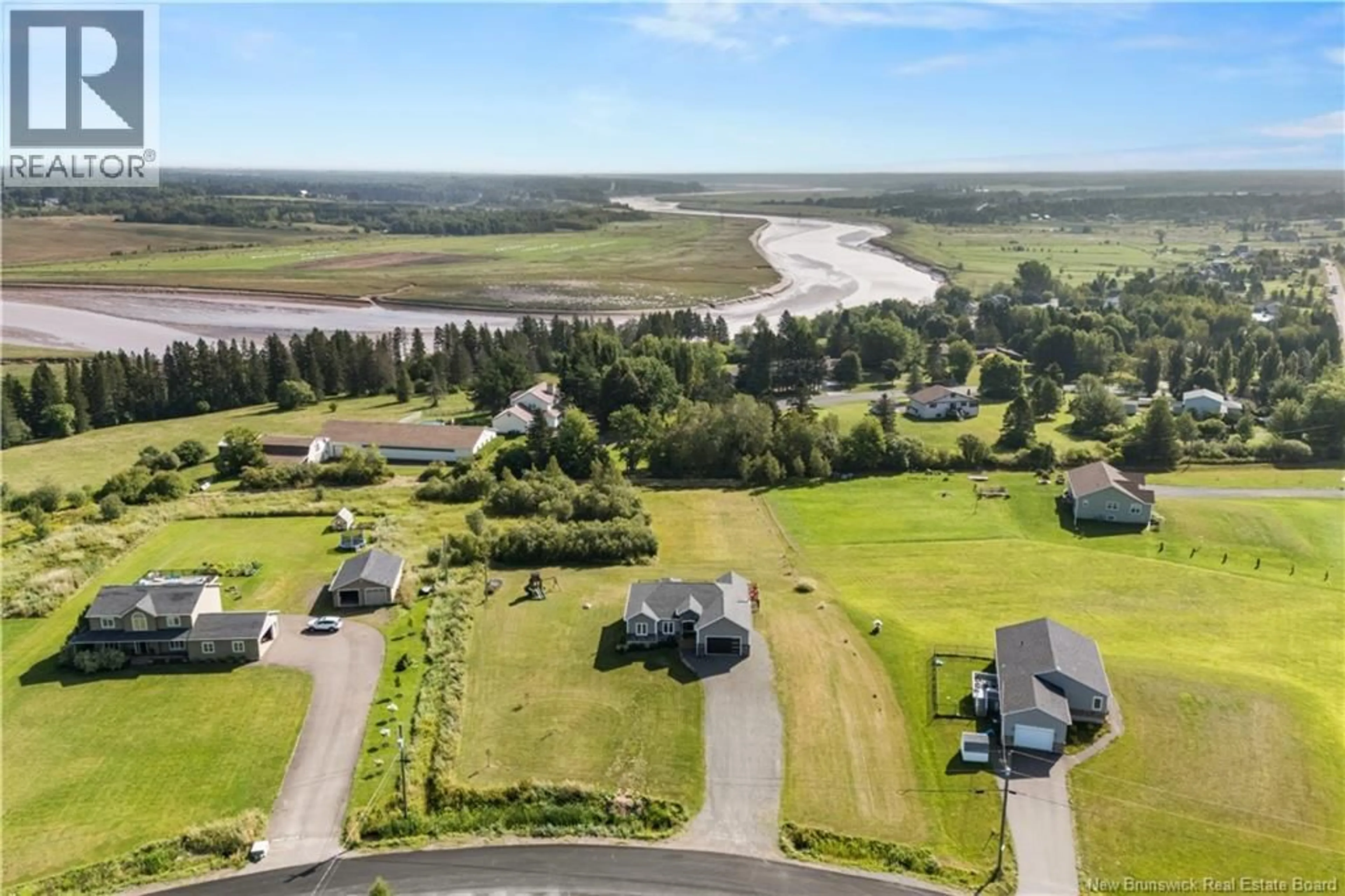A pic from outside/outdoor area/front of a property/back of a property/a pic from drone, water/lake/river/ocean view for 6 TUCKER STREET, Upper Coverdale New Brunswick E1J0B4