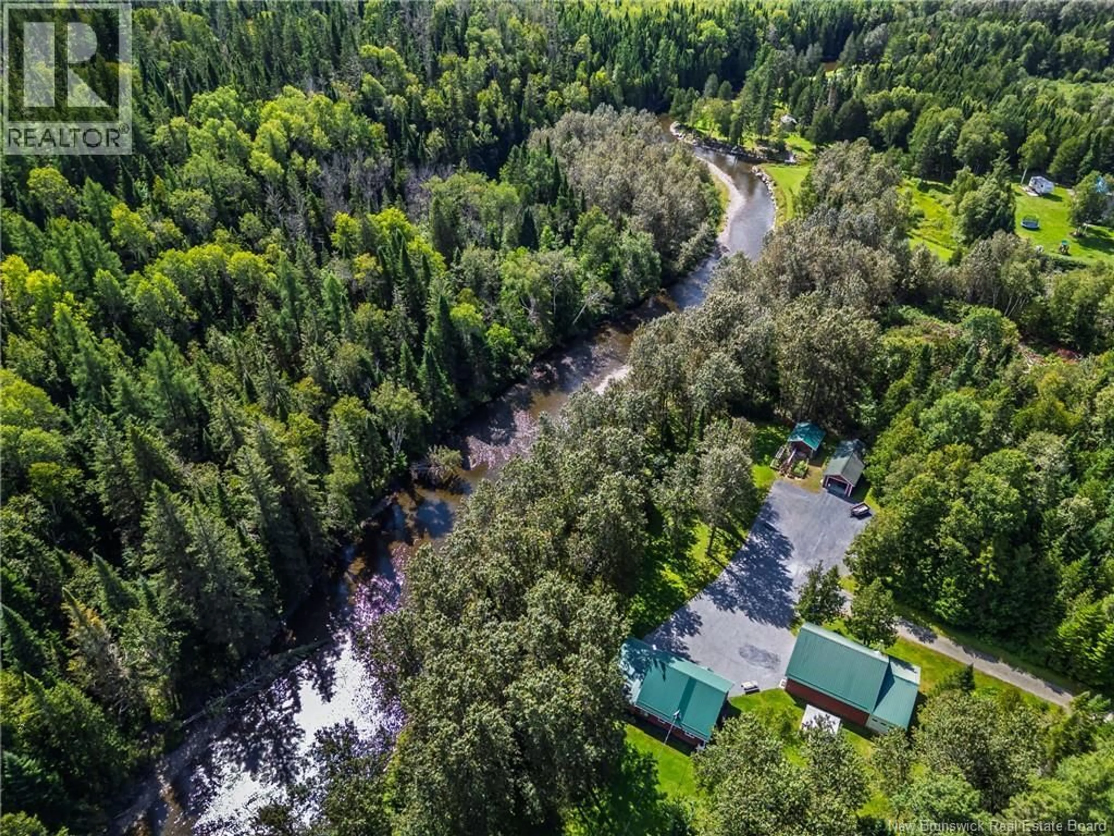 A pic from outside/outdoor area/front of a property/back of a property/a pic from drone, forest/trees view for 38 CH CAMP, DSL de Drummond/DSL of Drummond New Brunswick E3Y3X9