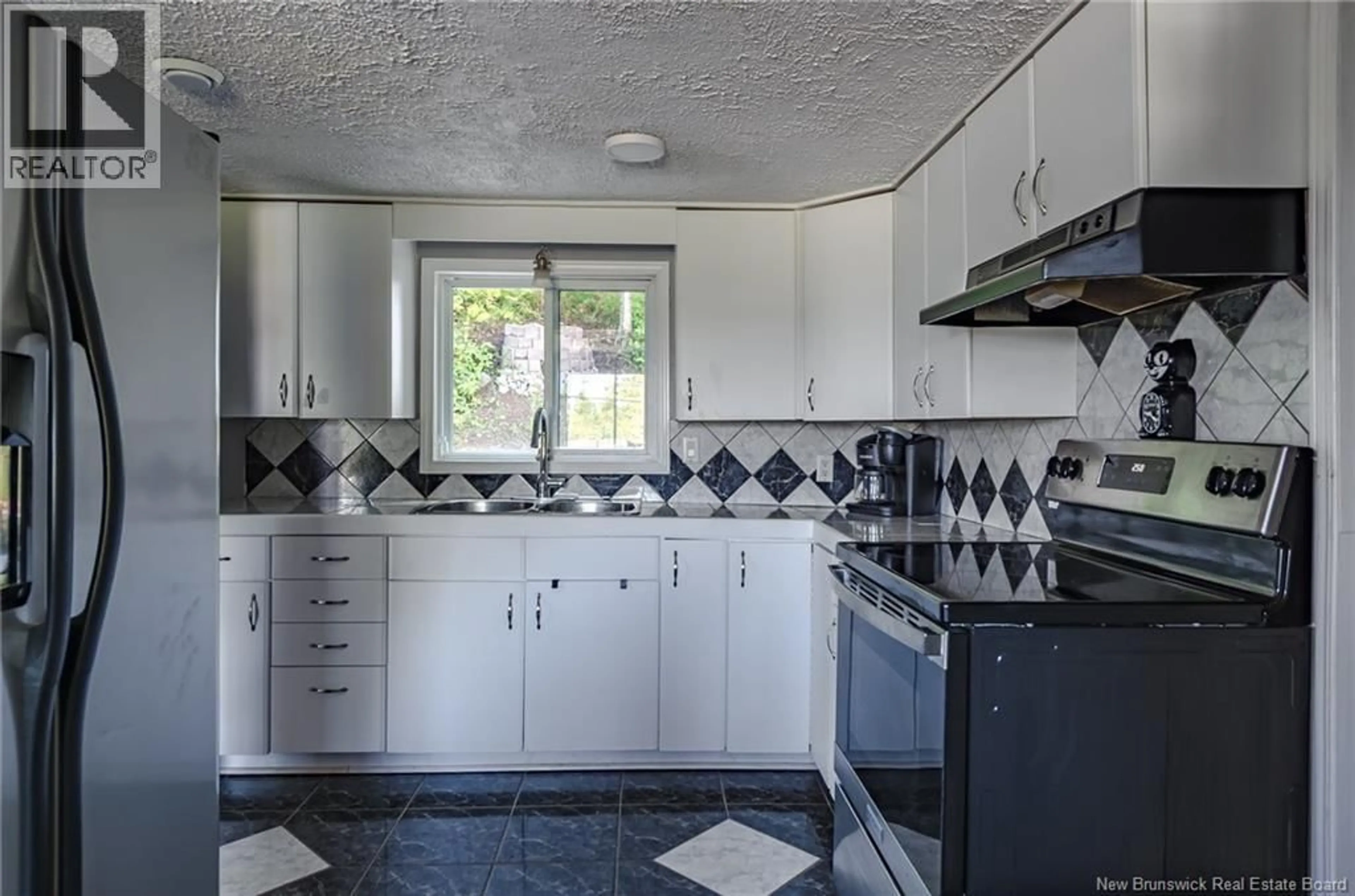 Standard kitchen, ceramic/tile floor for 225 WOOLASTOOK DRIVE, Grand Bay-Westfield New Brunswick E5K1S7