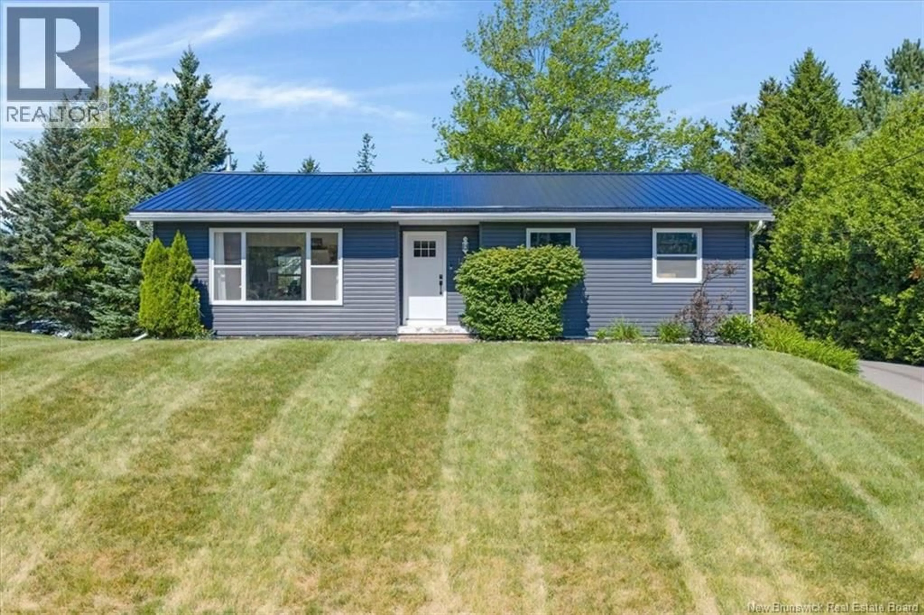 Home with vinyl exterior material, street for 16 BROOK STREET, Quispamsis New Brunswick E2G1P3