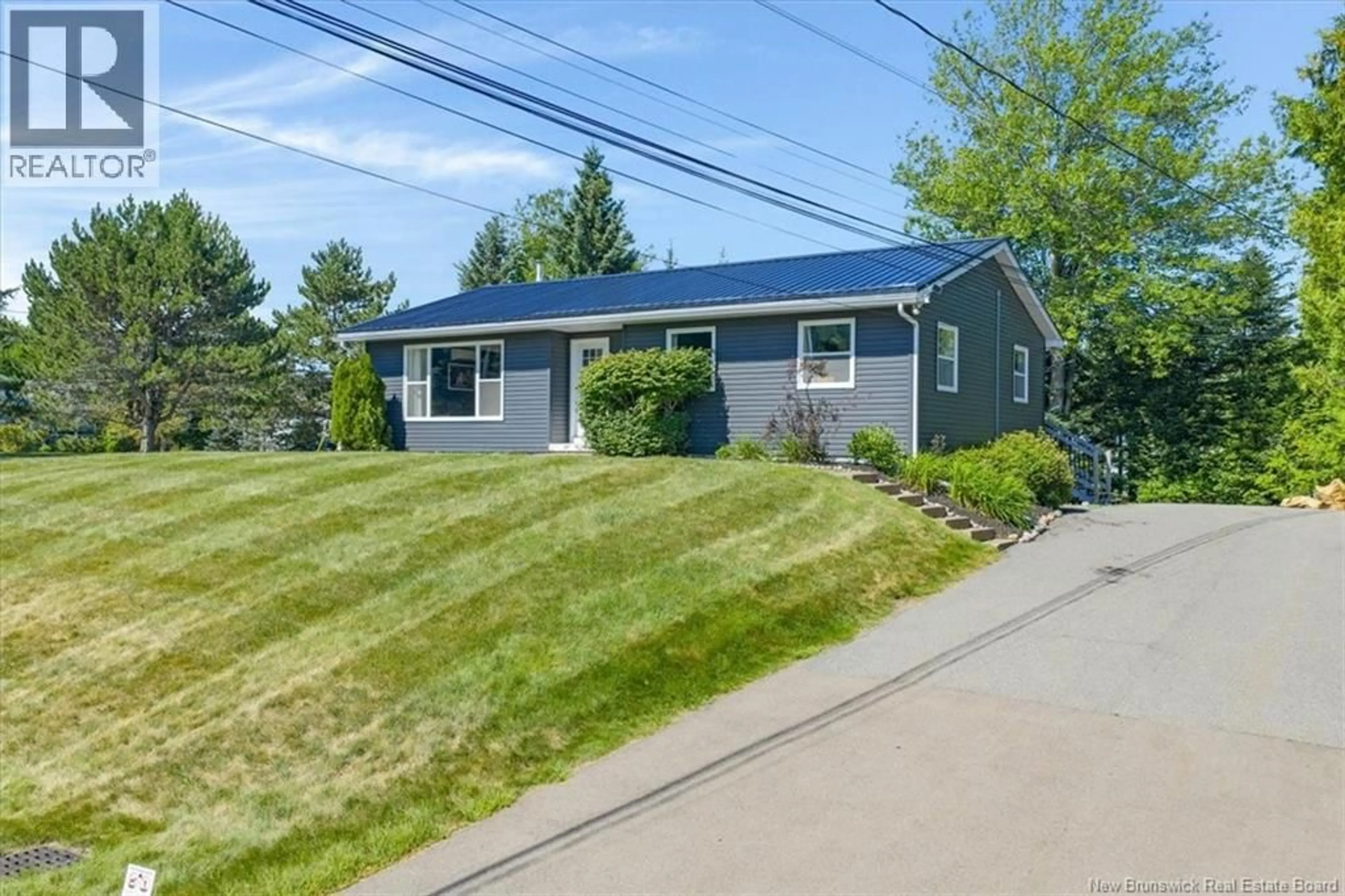 Home with vinyl exterior material, street for 16 BROOK STREET, Quispamsis New Brunswick E2G1P3