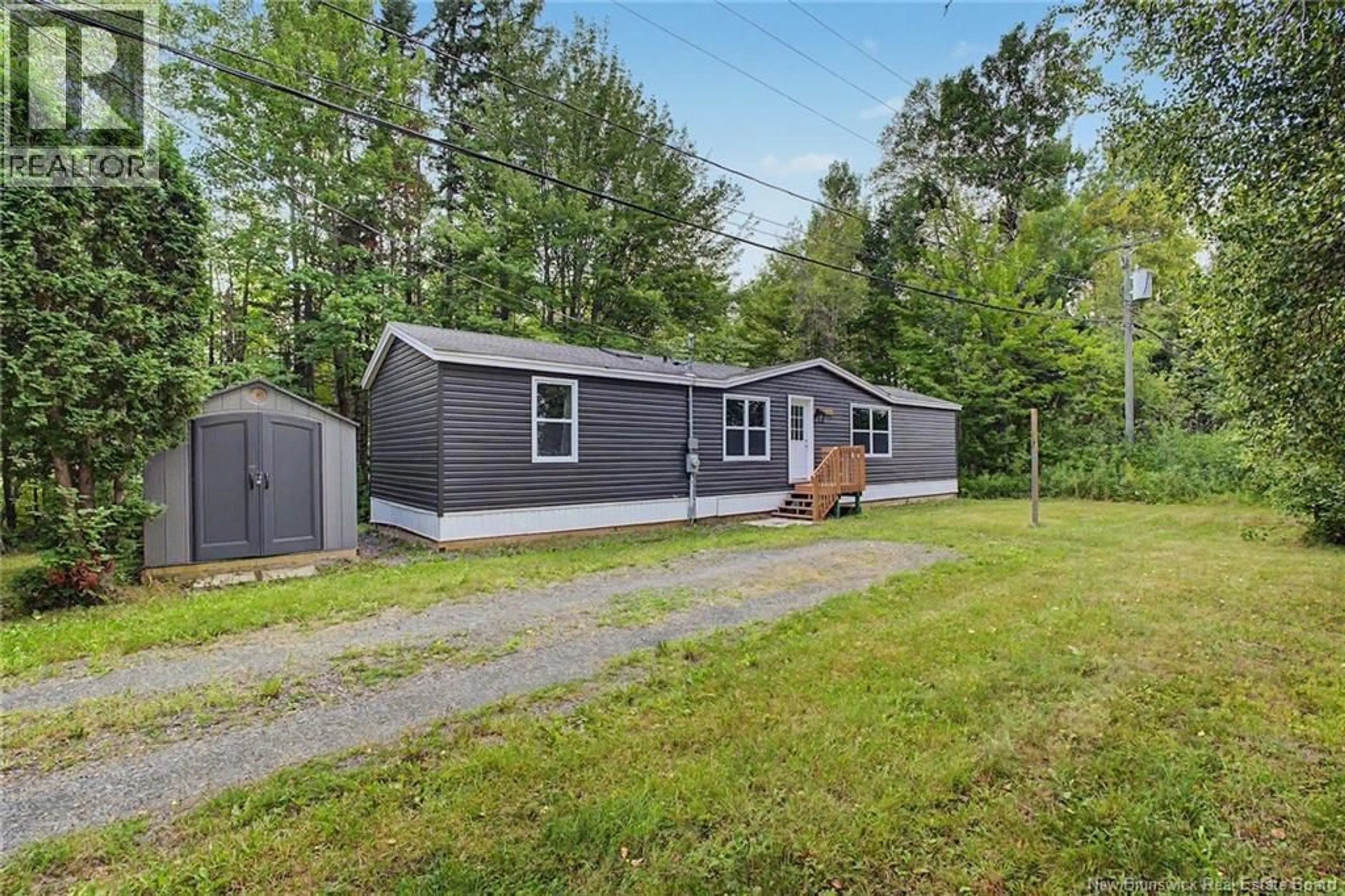 Home with vinyl exterior material, street for 1 DALEY STREET, Lincoln New Brunswick E3B6Z5