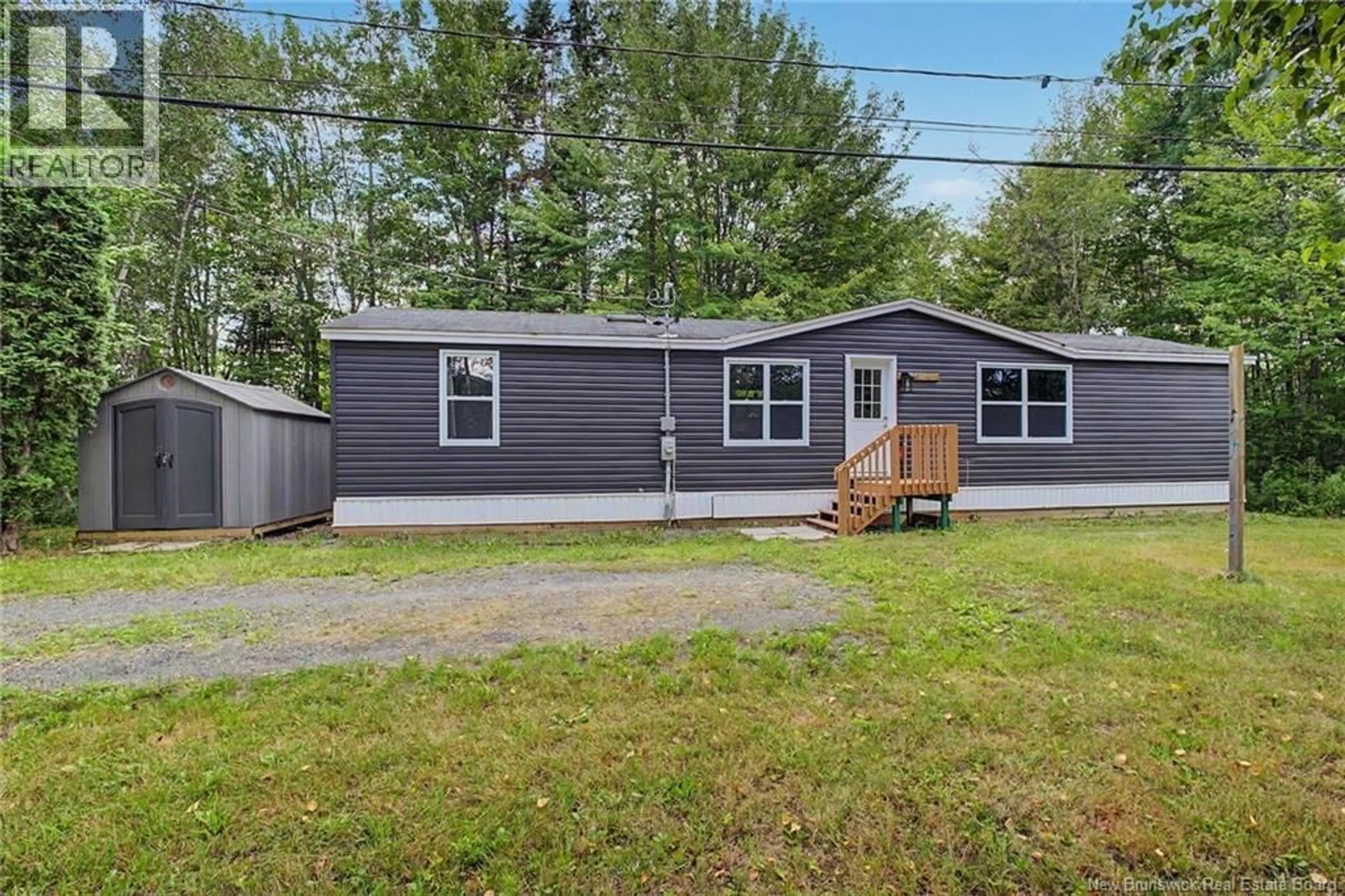 Home with vinyl exterior material, street for 1 DALEY STREET, Lincoln New Brunswick E3B6Z5