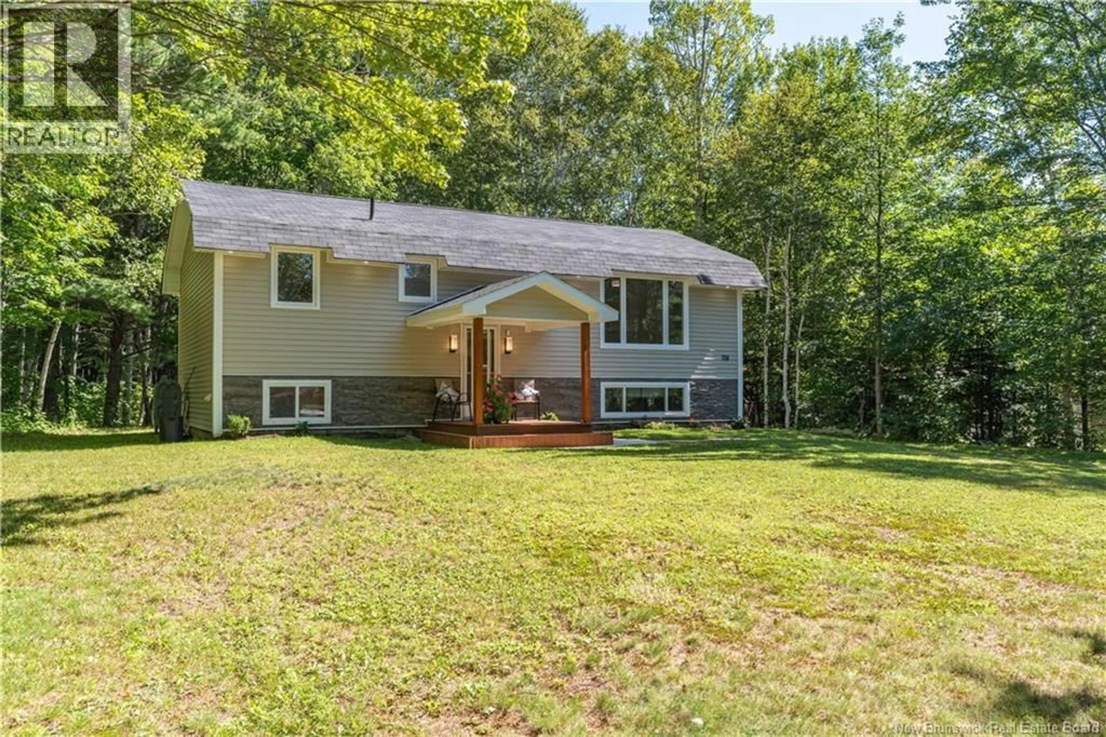 Home with vinyl exterior material, forest/trees view for 67 MOOREFIELD ROAD, Miramichi New Brunswick E1V7B3