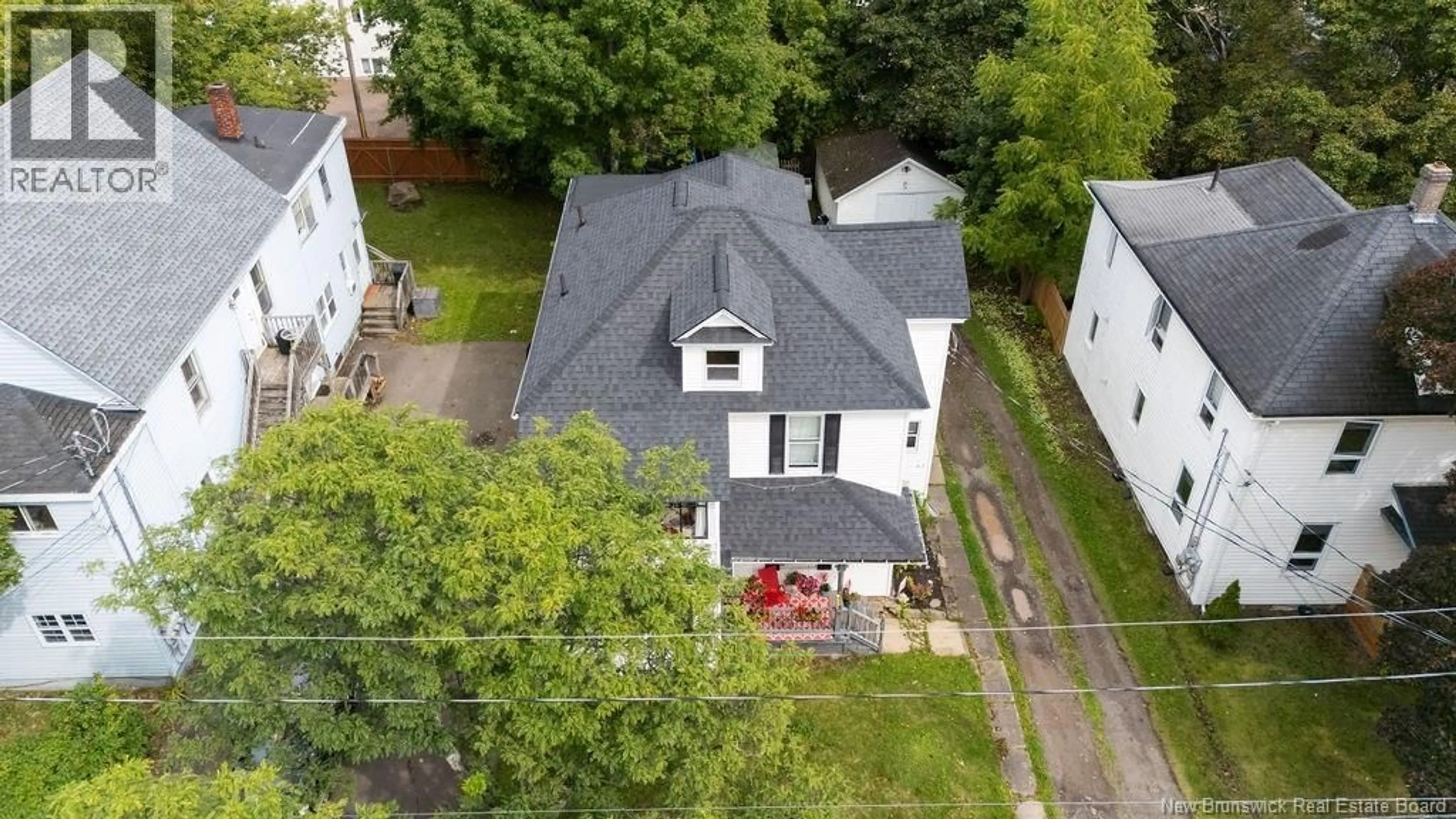 A pic from outside/outdoor area/front of a property/back of a property/a pic from drone, street for 93-95 CORNHILL STREET, Moncton New Brunswick E1B6K8
