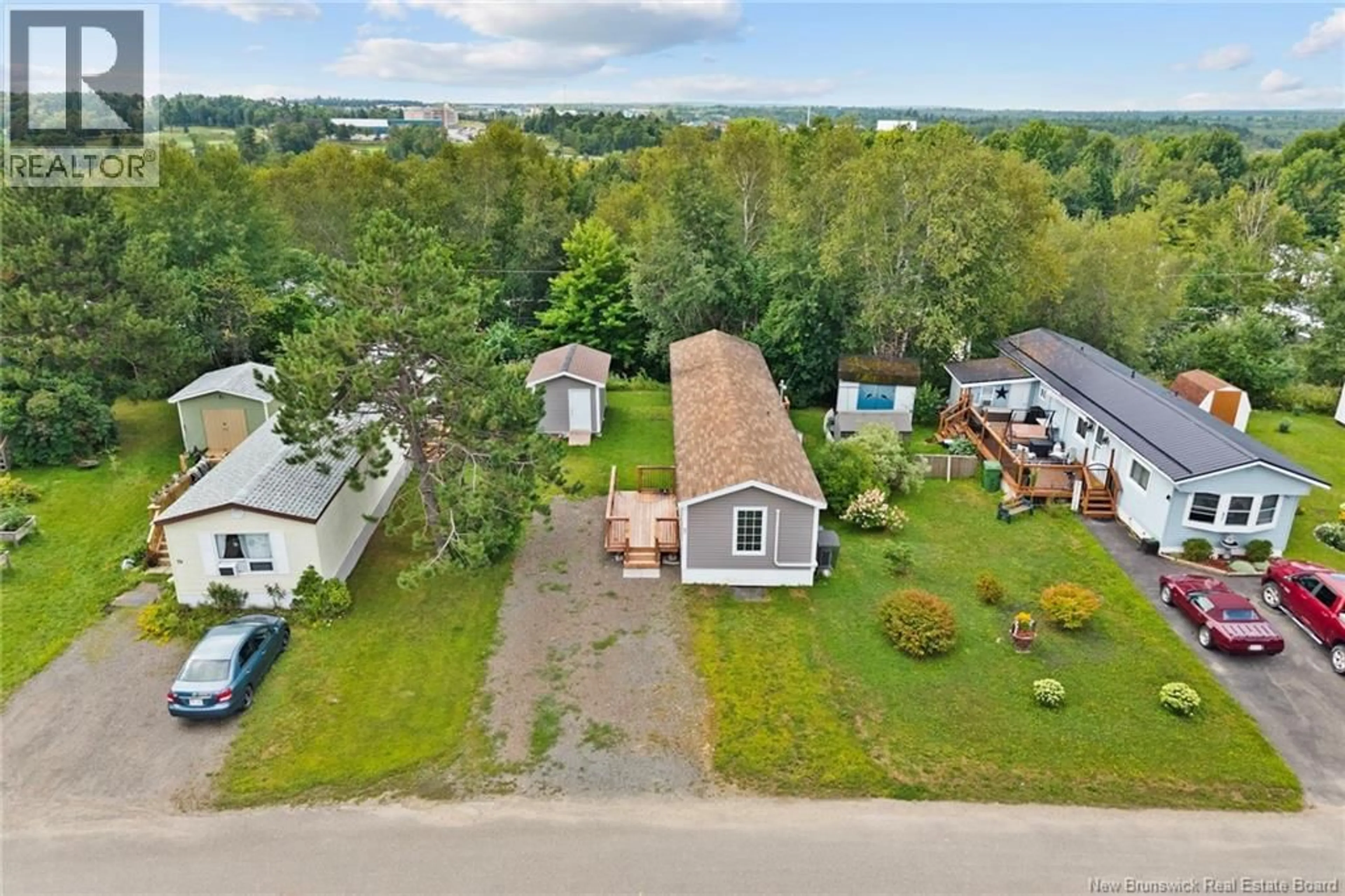 A pic from outside/outdoor area/front of a property/back of a property/a pic from drone, unknown for 83 LEAFWOOD CRESCENT, Fredericton New Brunswick E3B6N9