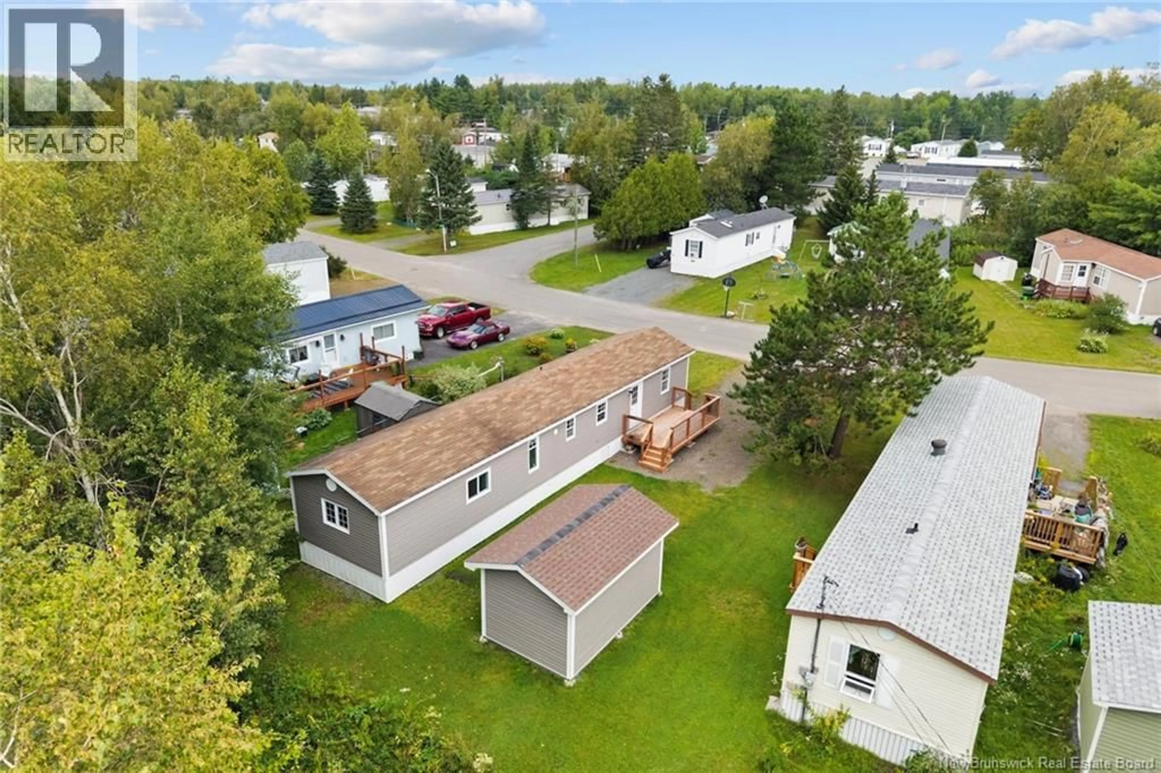 A pic from outside/outdoor area/front of a property/back of a property/a pic from drone, street for 83 LEAFWOOD CRESCENT, Fredericton New Brunswick E3B6N9