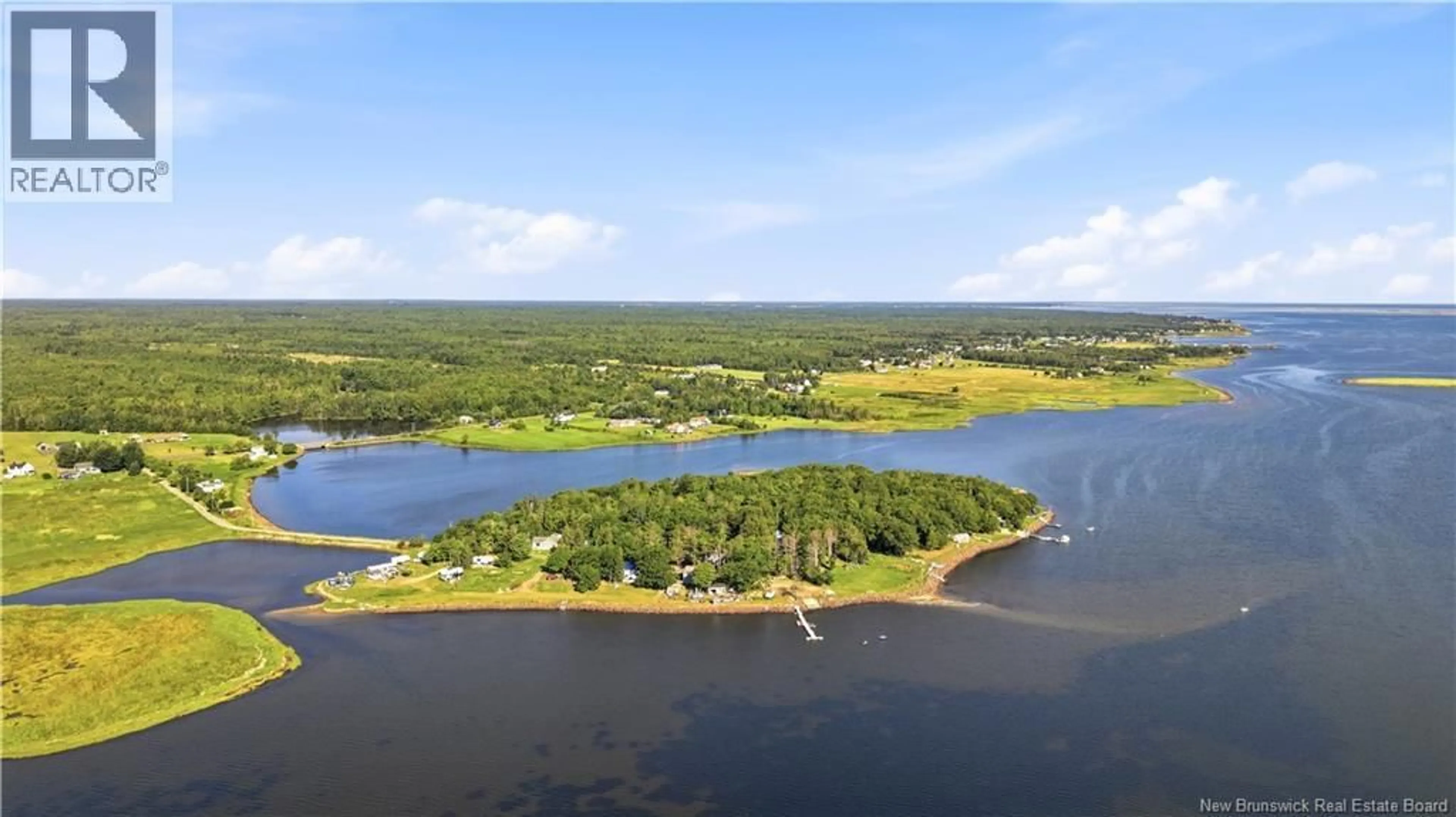 A pic from outside/outdoor area/front of a property/back of a property/a pic from drone, water/lake/river/ocean view for 7 BUCCANEER, Cocagne New Brunswick E4R2G7