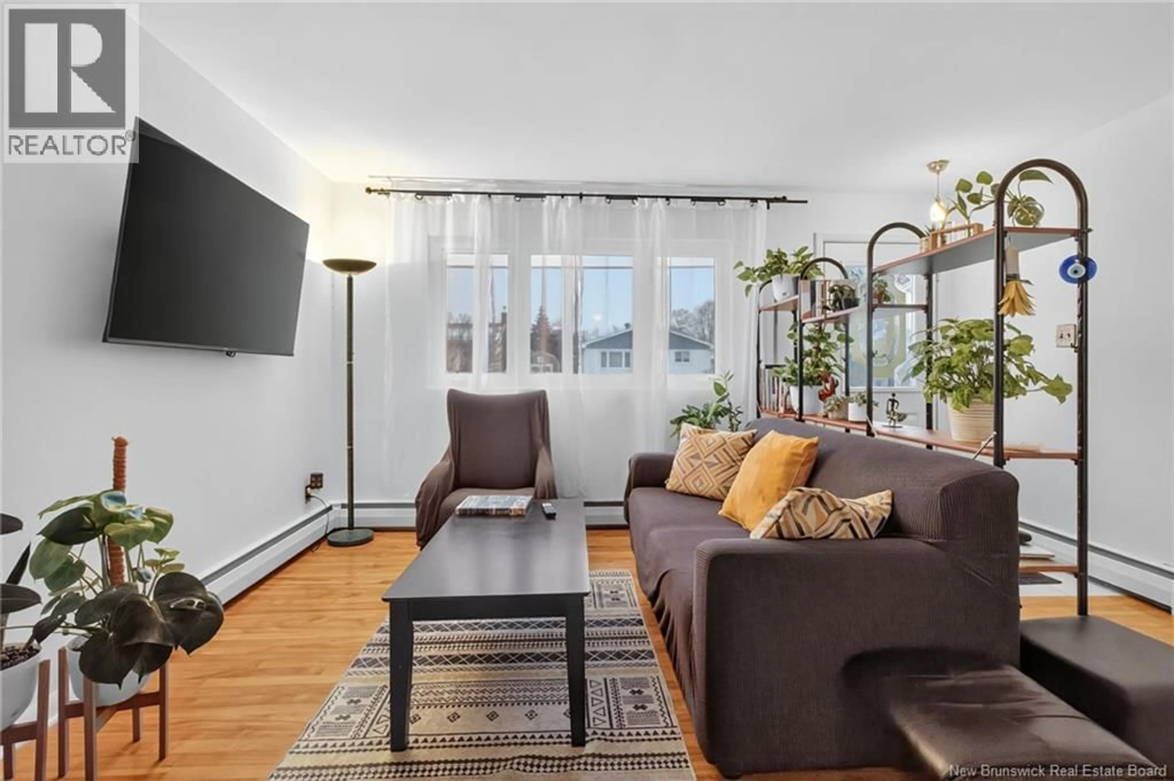 Living room with furniture, unknown for 141 ATKINSON, Moncton New Brunswick E1C8M9