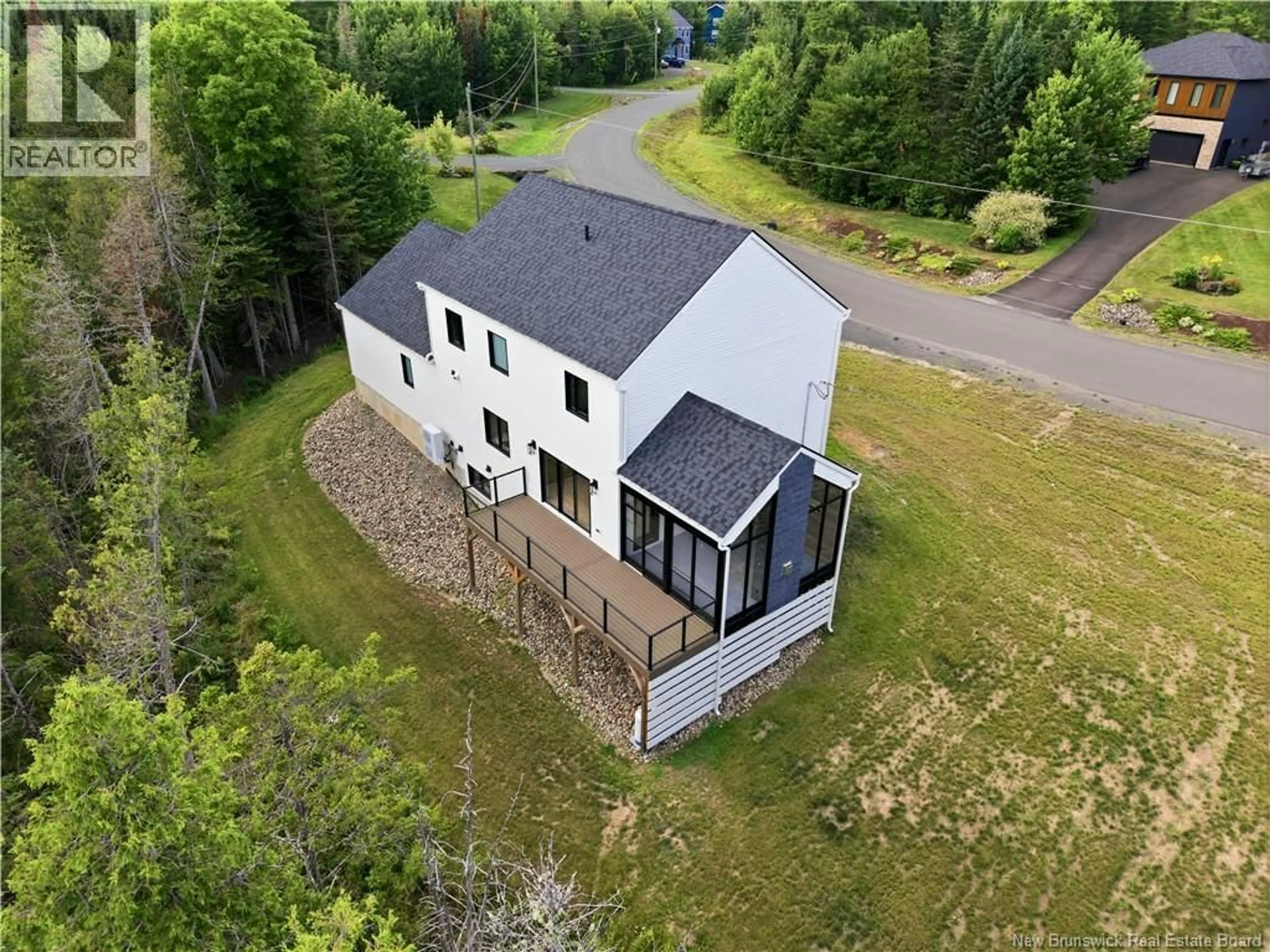 A pic from outside/outdoor area/front of a property/back of a property/a pic from drone, unknown for 75 SANDSTONE DRIVE, Hanwell New Brunswick E3E0C3