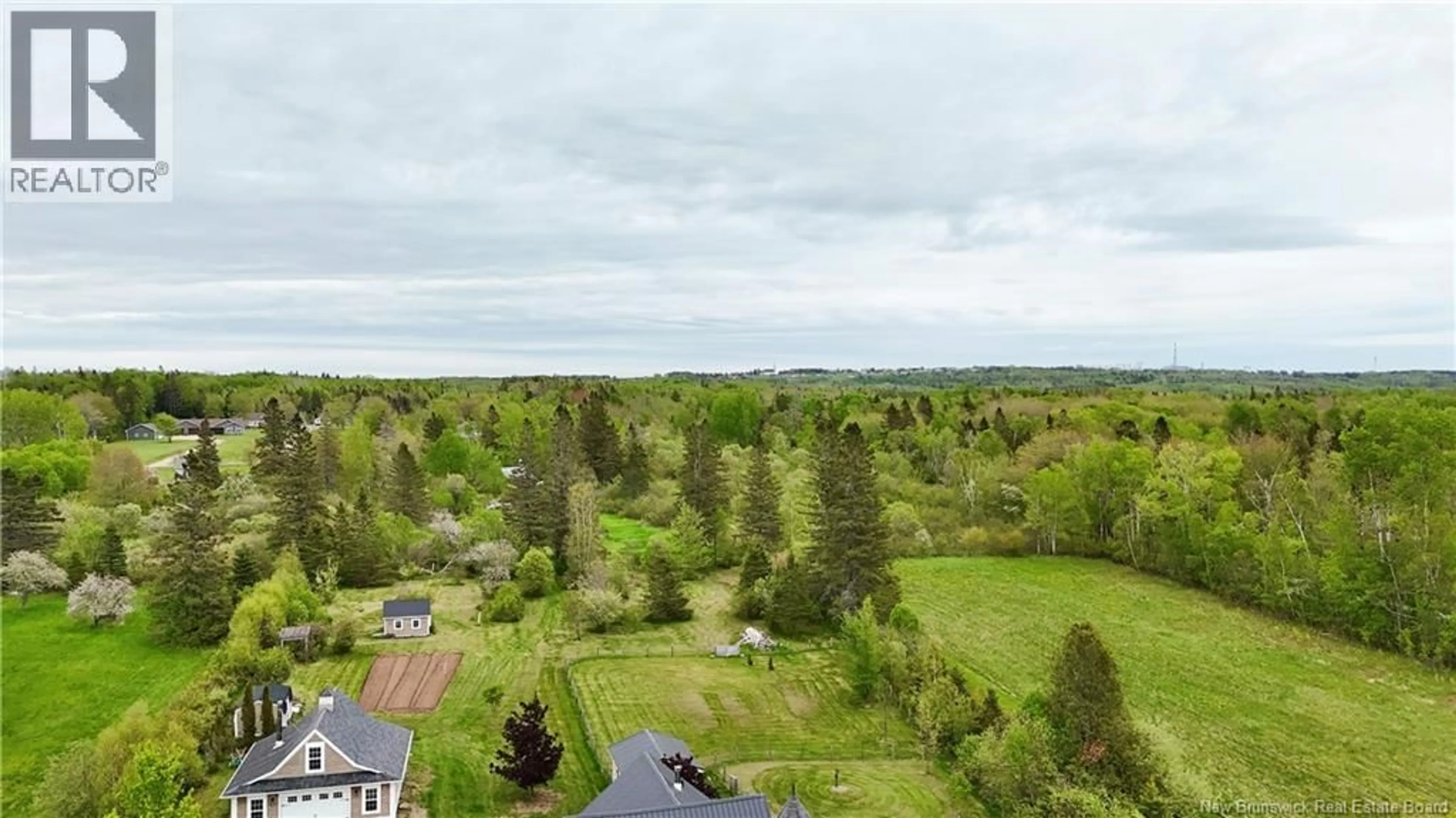 A pic from outside/outdoor area/front of a property/back of a property/a pic from drone, forest/trees view for 521 ROYAL, Memramcook New Brunswick E4K1N7