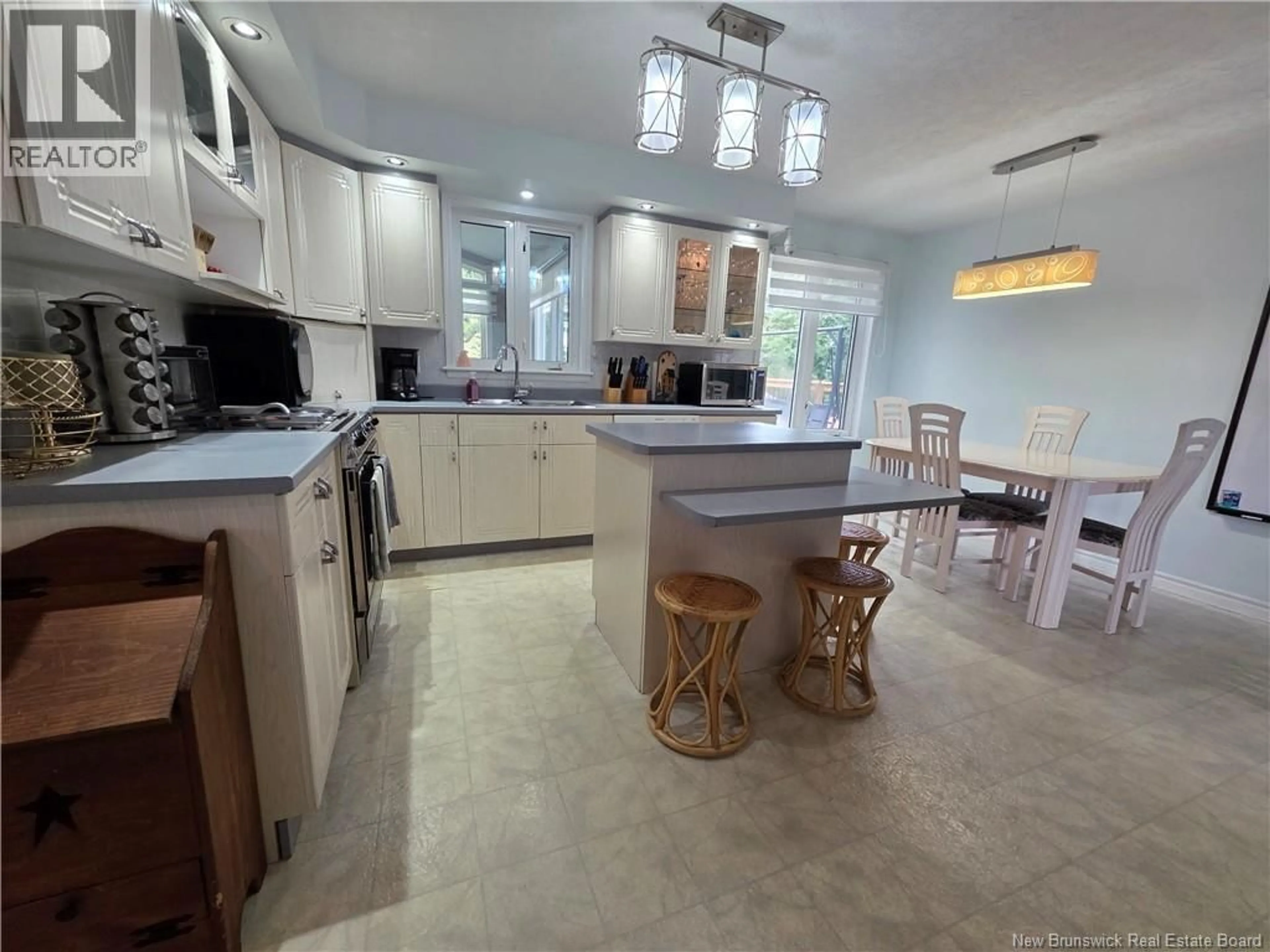 Open concept kitchen, ceramic/tile floor for 368 ROUTE 255, Saint-André New Brunswick E3Y2V8
