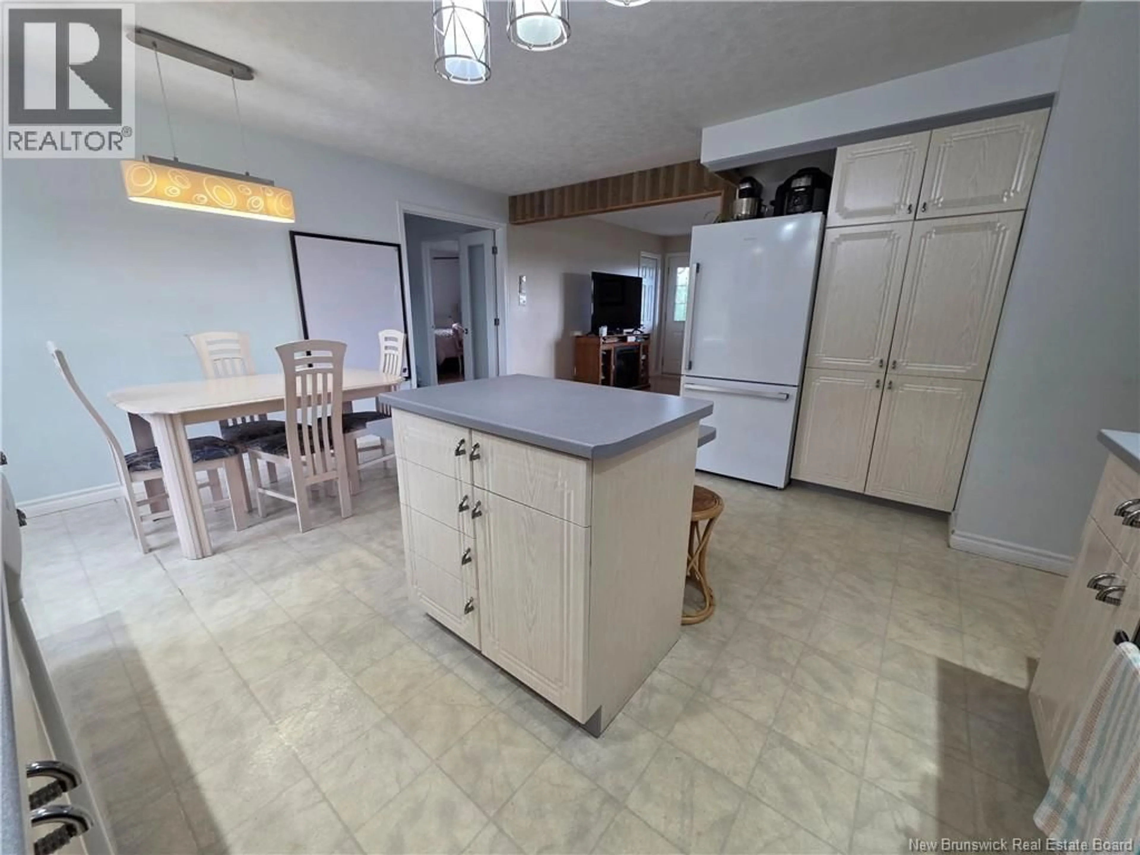 Open concept kitchen, ceramic/tile floor for 368 ROUTE 255, Saint-André New Brunswick E3Y2V8