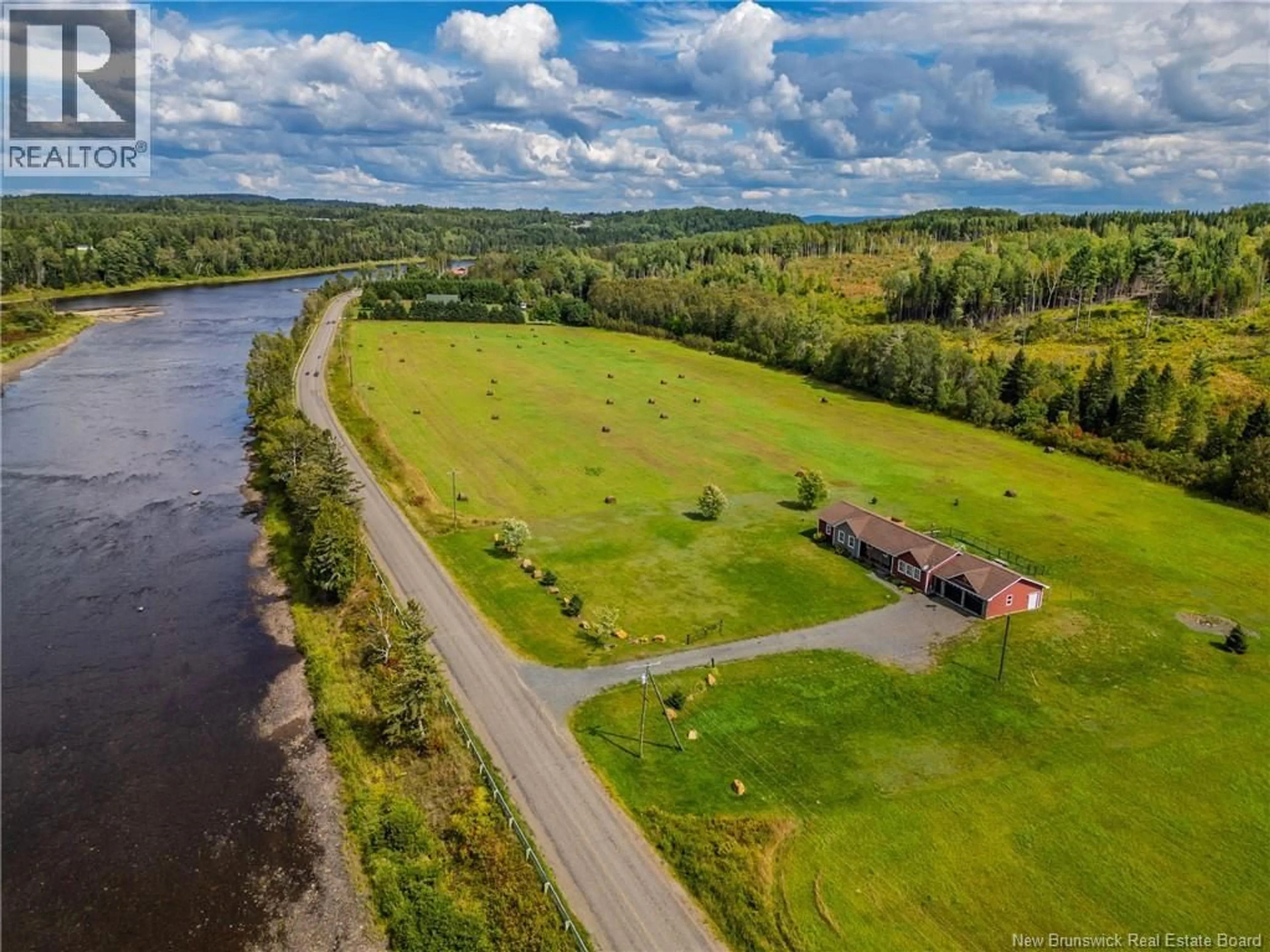 A pic from outside/outdoor area/front of a property/back of a property/a pic from drone, water/lake/river/ocean view for 2944 ROUTE 390, Saint Almo New Brunswick E7G4H5
