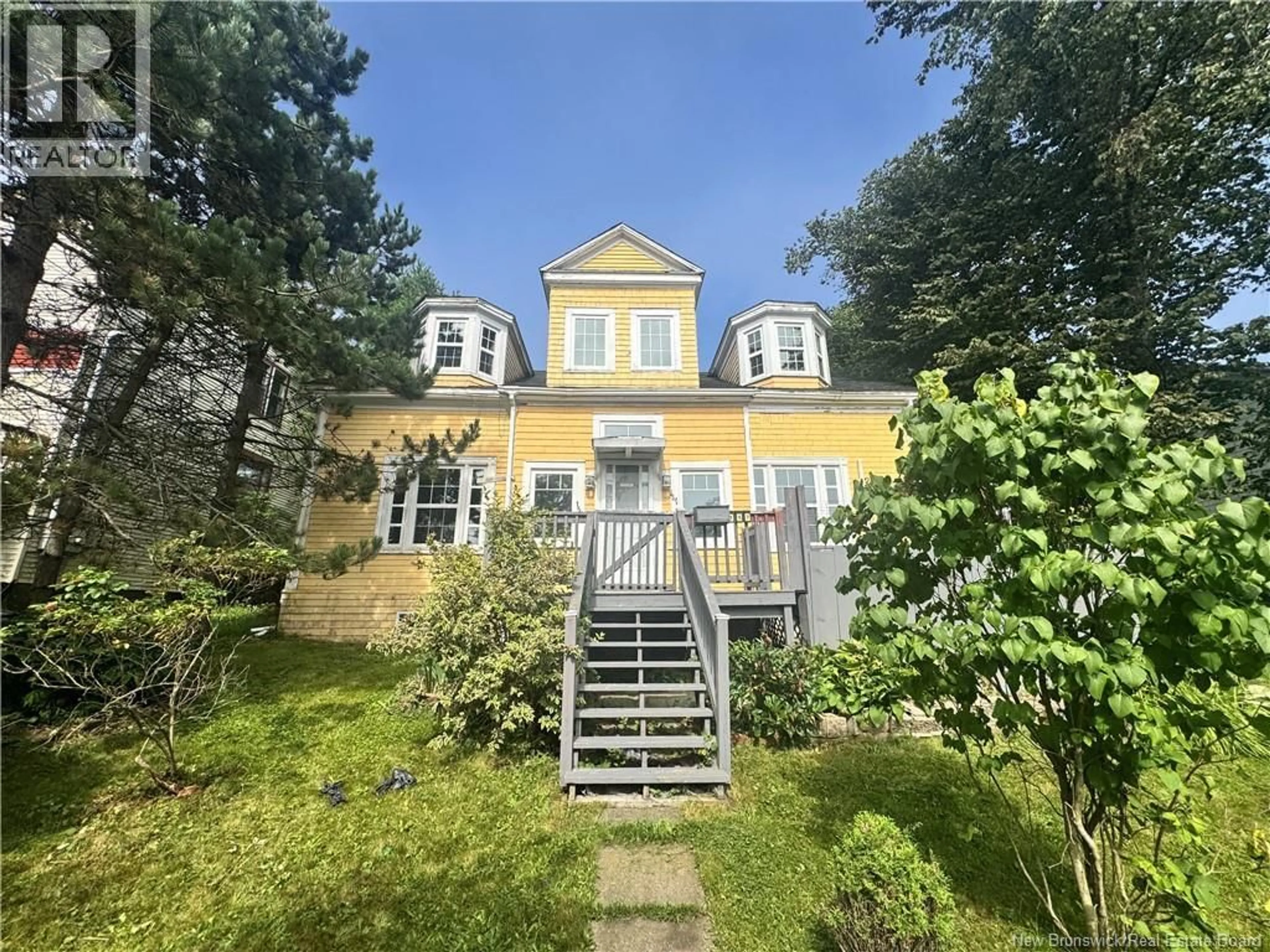 A pic from outside/outdoor area/front of a property/back of a property/a pic from drone, street for 157 WINSLOW STREET, Saint John New Brunswick E2M1W7