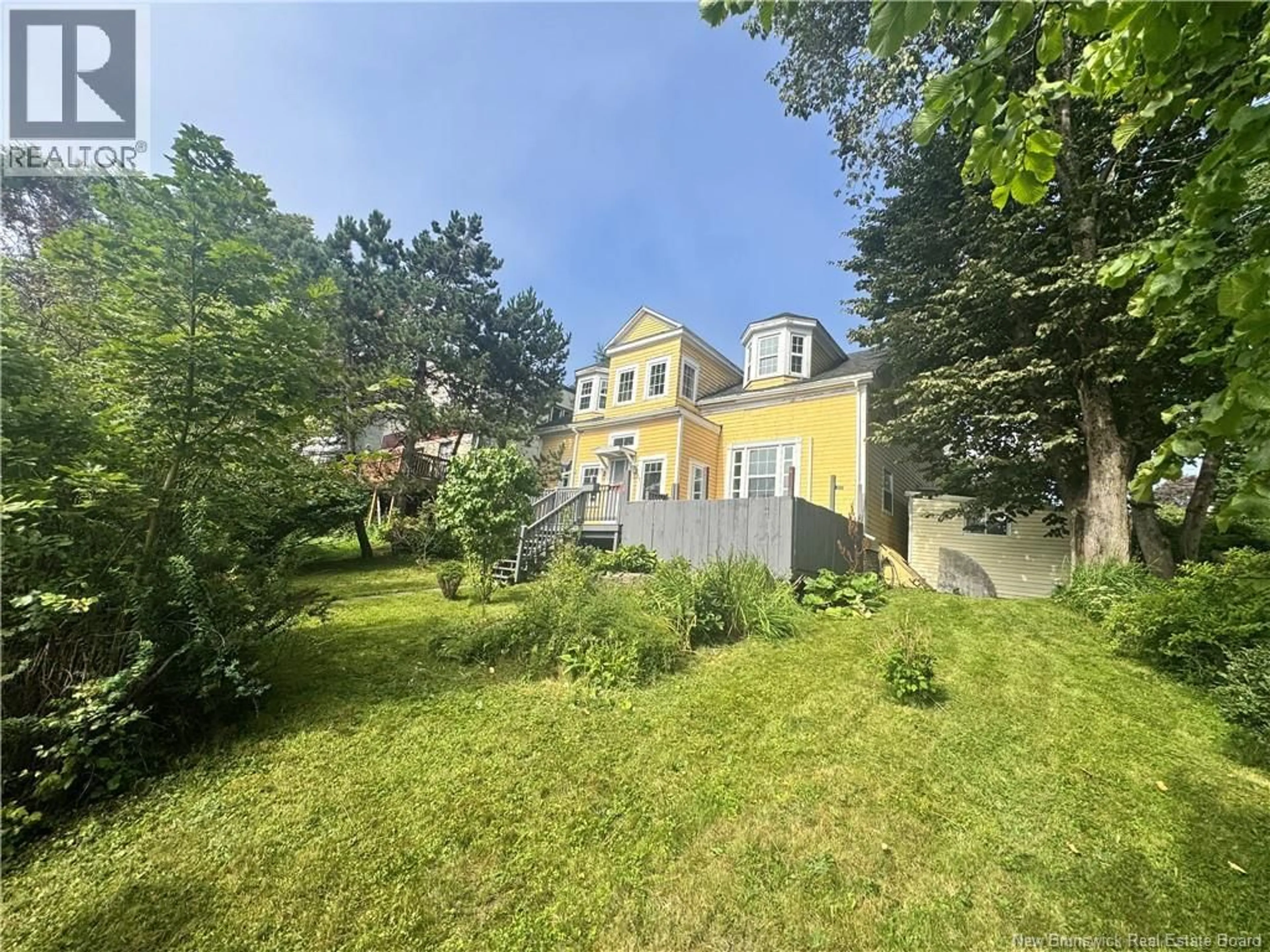 A pic from outside/outdoor area/front of a property/back of a property/a pic from drone, street for 157 WINSLOW STREET, Saint John New Brunswick E2M1W7