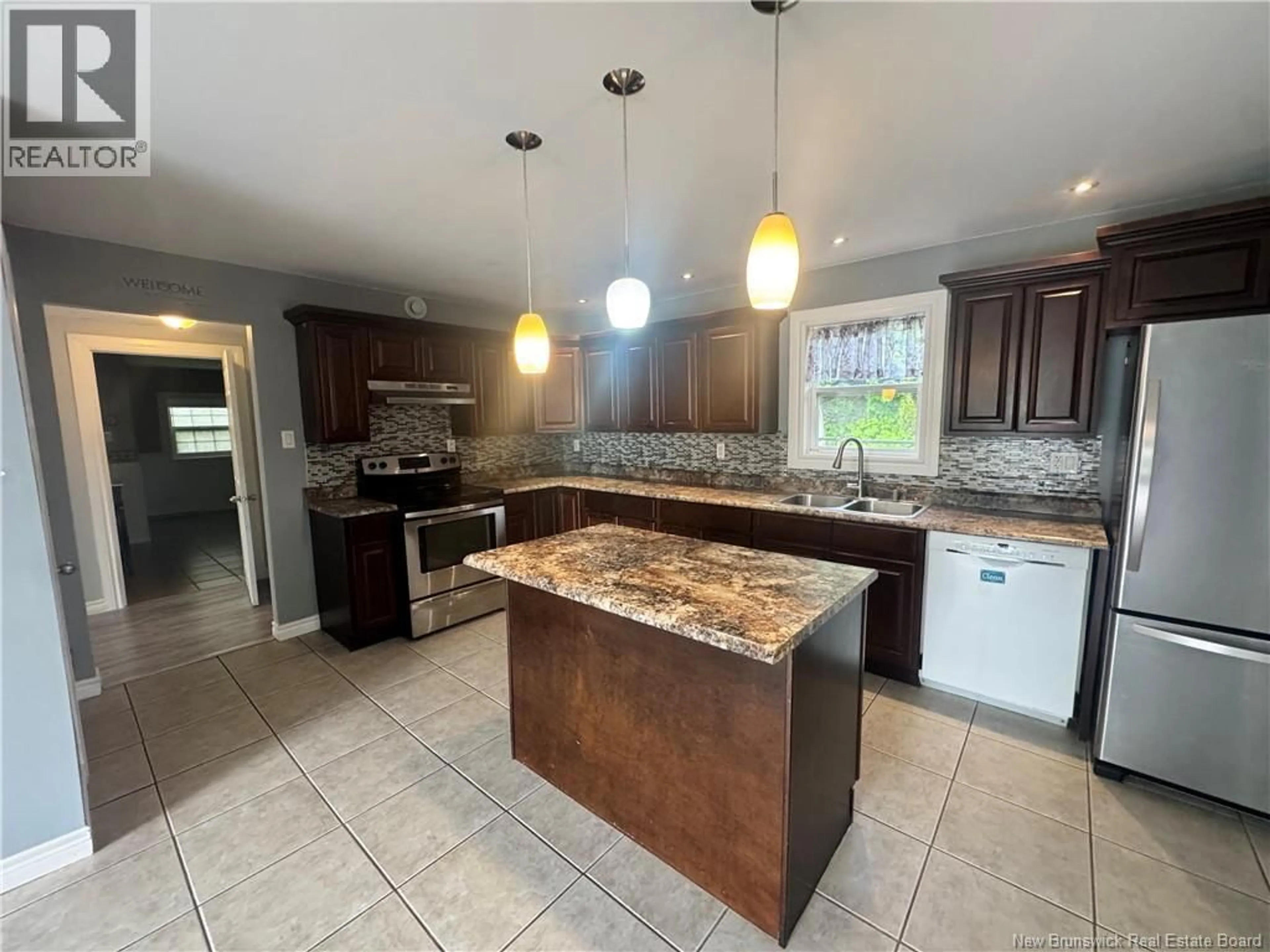 Open concept kitchen, ceramic/tile floor for 157 WINSLOW STREET, Saint John New Brunswick E2M1W7