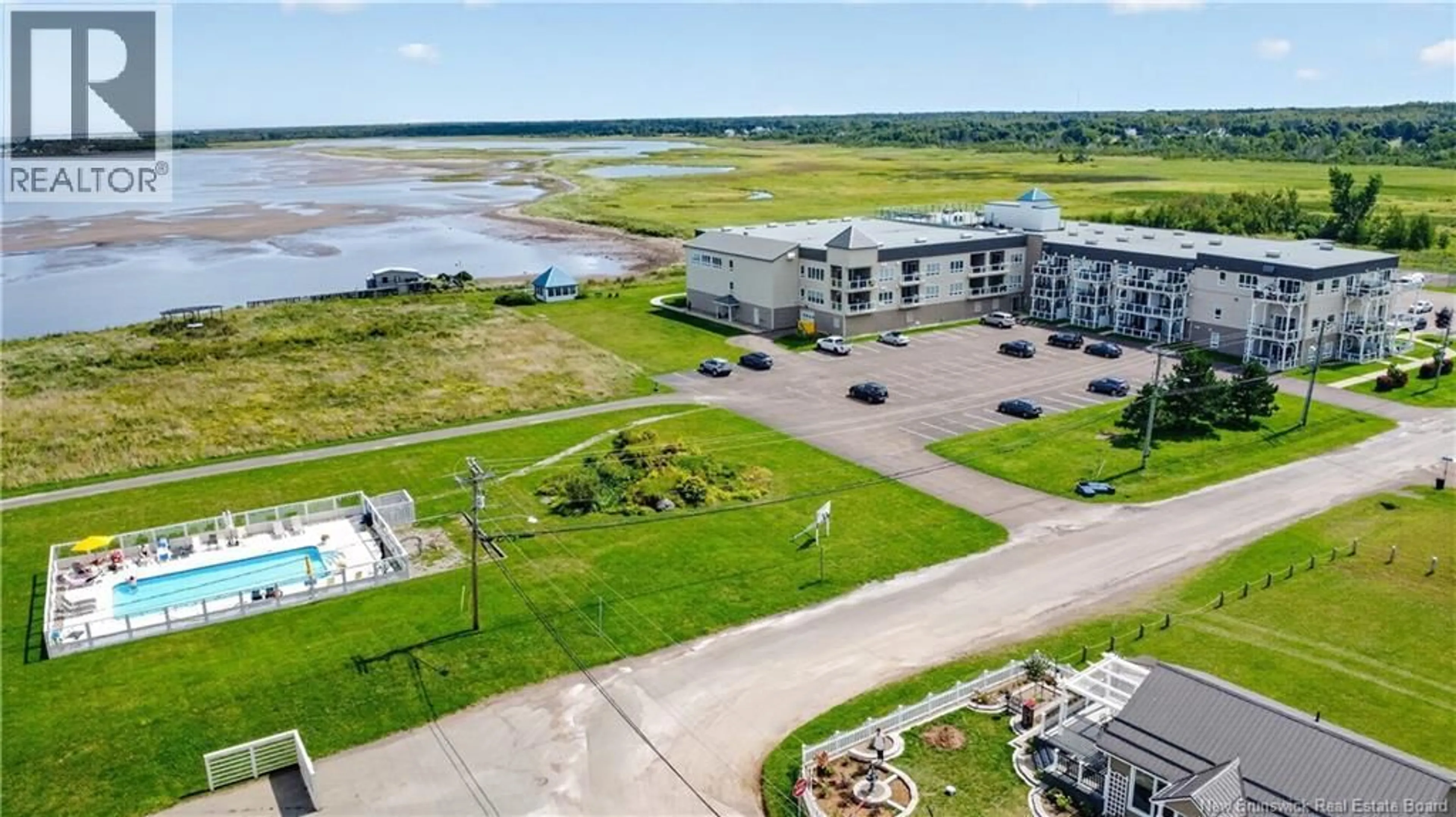A pic from outside/outdoor area/front of a property/back of a property/a pic from drone, water/lake/river/ocean view for 314 - 69 CAP BIMET BOULEVARD, Grand-Barachois New Brunswick E4P6X5