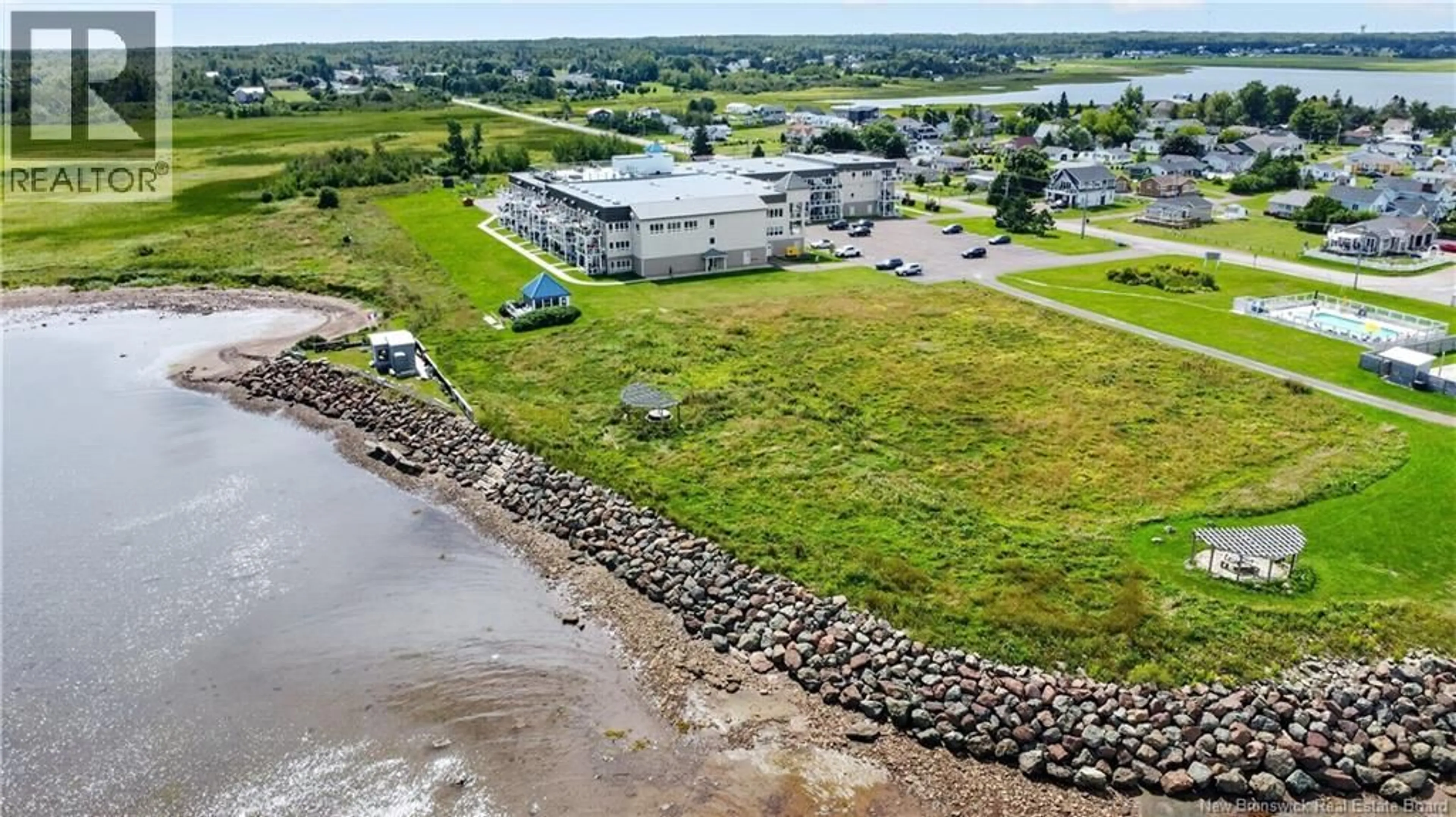 A pic from outside/outdoor area/front of a property/back of a property/a pic from drone, water/lake/river/ocean view for 314 - 69 CAP BIMET BOULEVARD, Grand-Barachois New Brunswick E4P6X5