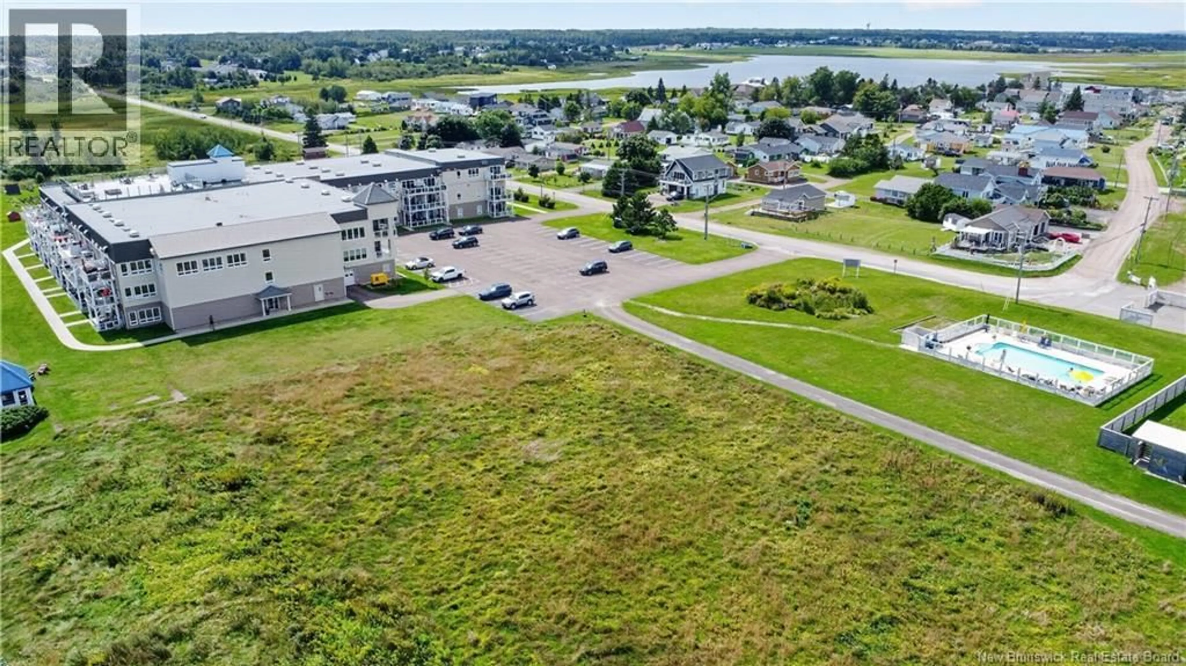 A pic from outside/outdoor area/front of a property/back of a property/a pic from drone, water/lake/river/ocean view for 314 - 69 CAP BIMET BOULEVARD, Grand-Barachois New Brunswick E4P6X5