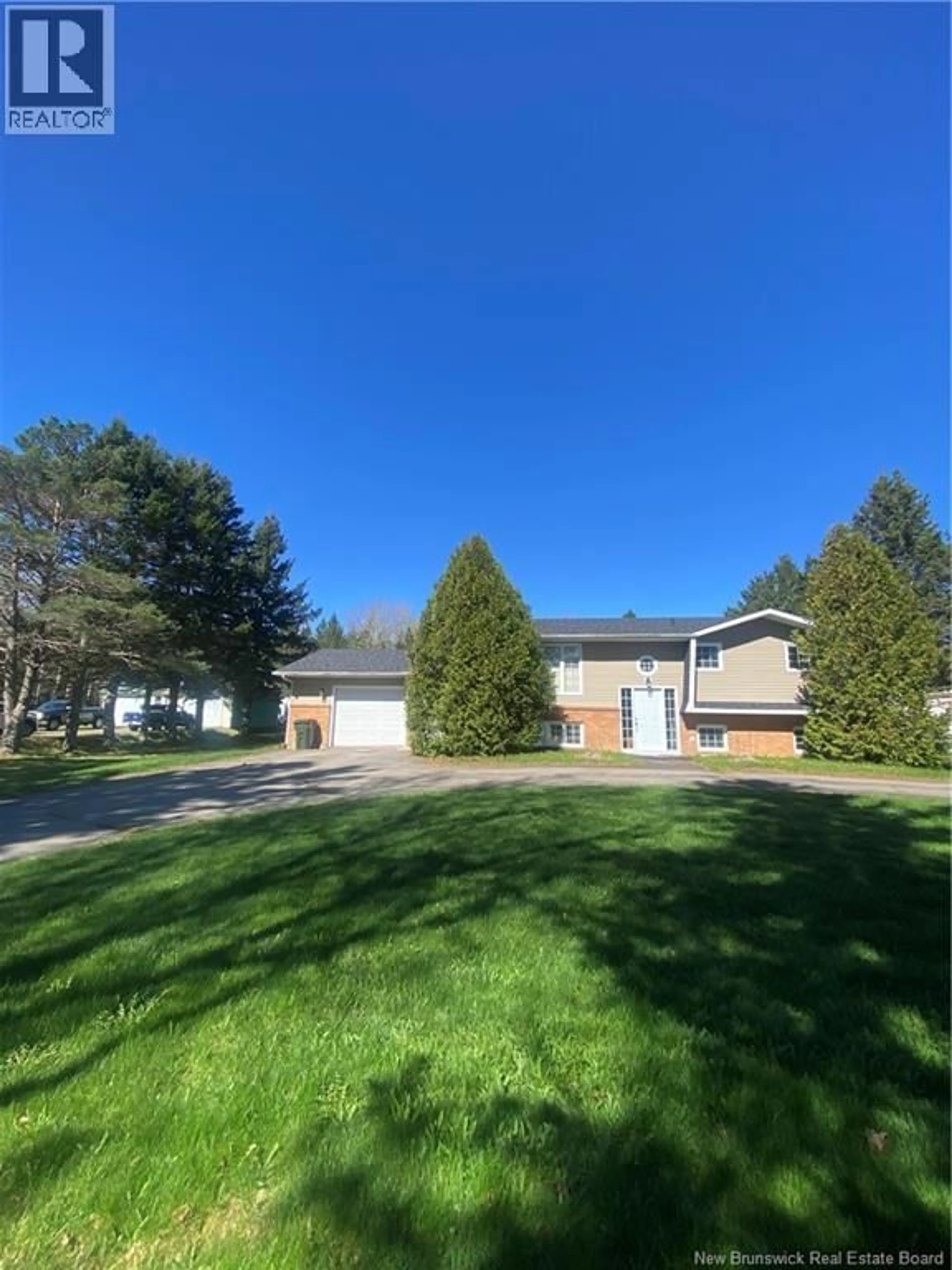 A pic from outside/outdoor area/front of a property/back of a property/a pic from drone, street for 153 CORMIER VILLAGE ROAD, Grand-Barachois New Brunswick E4P7A4