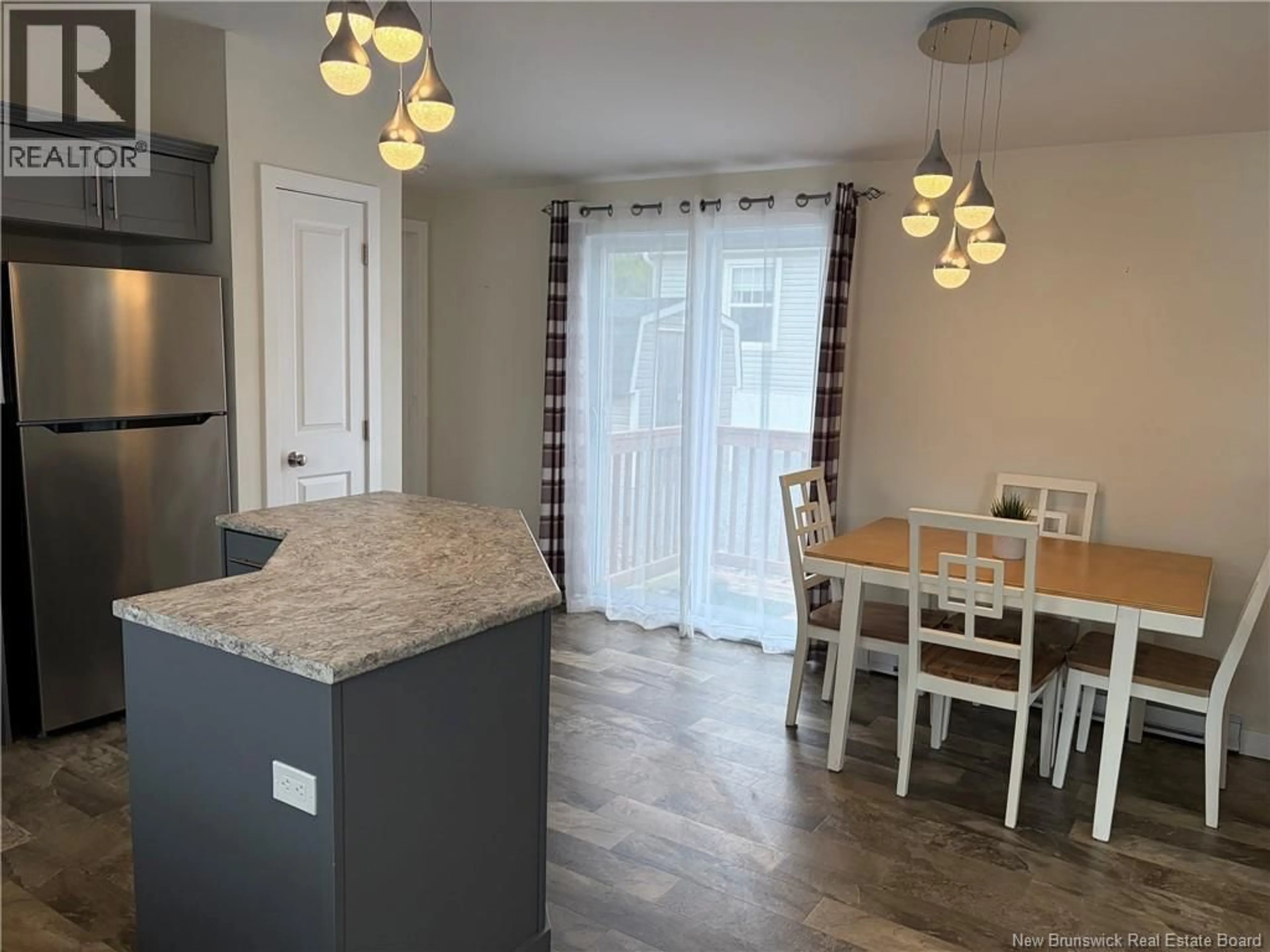 Open concept kitchen, wood/laminate floor for 89 GLENVIEW DRIVE, Saint John New Brunswick E2H2R4