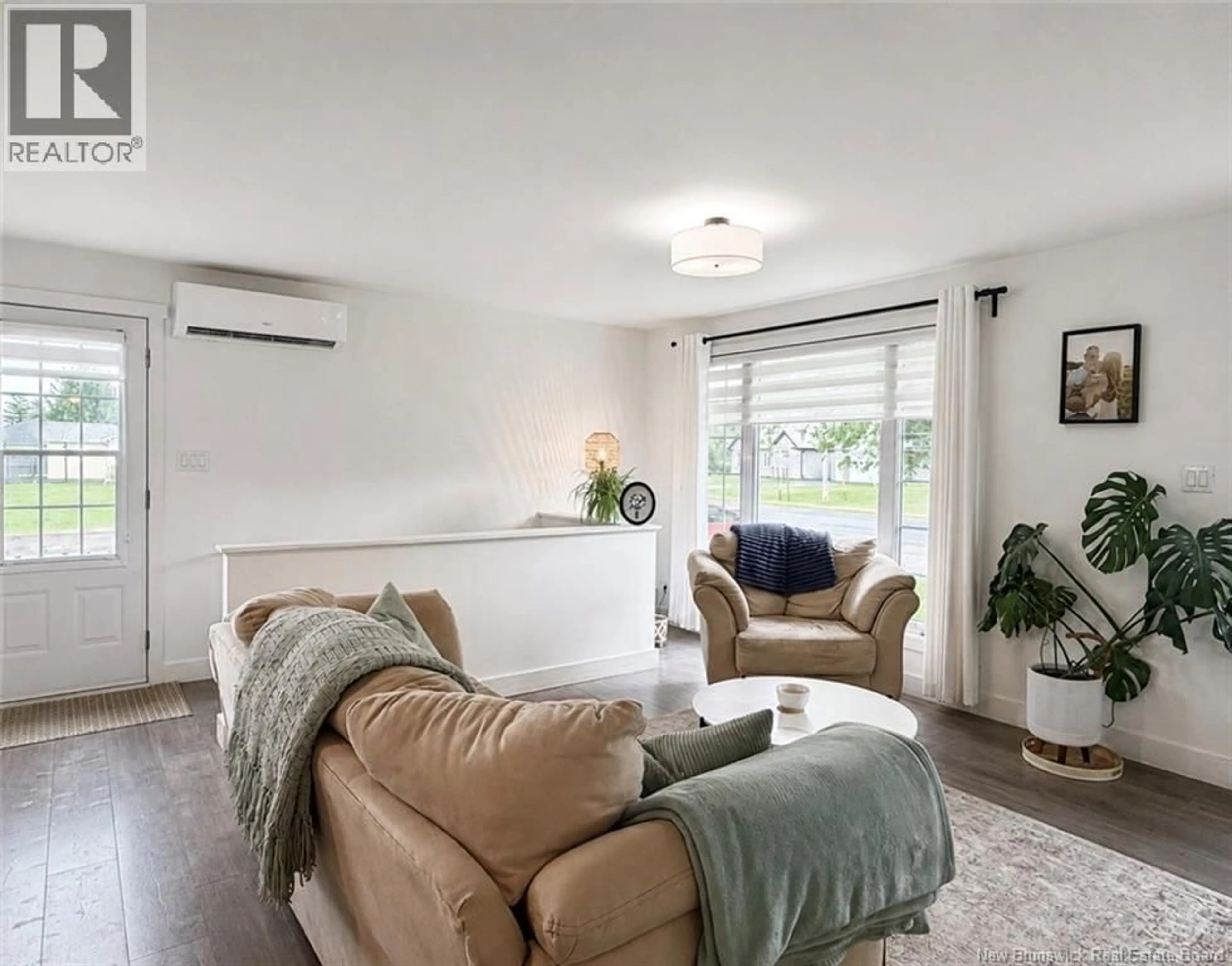 Living room with furniture, unknown for 108 KENT LODGE, Beresford New Brunswick E8K1B6