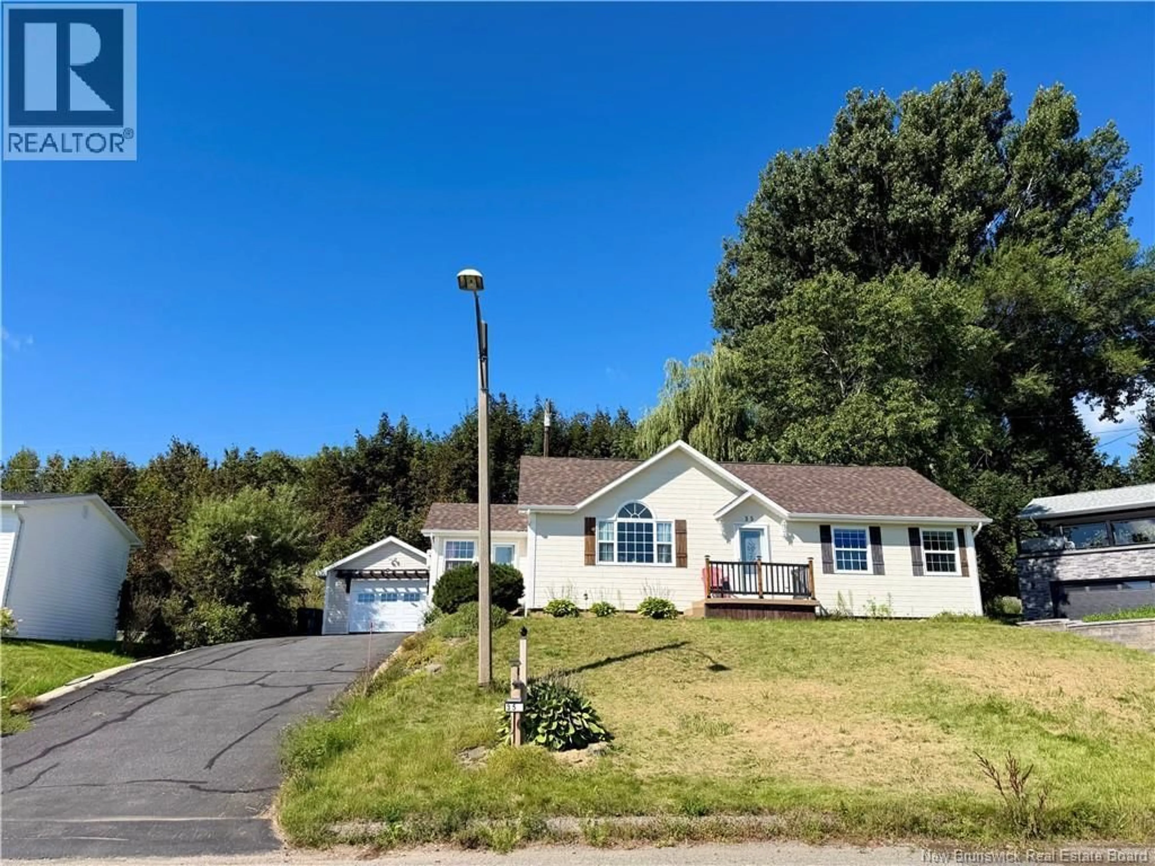 Home with vinyl exterior material, street for 35 COTE BLEU DRIVE, Bathurst New Brunswick E2A3G1