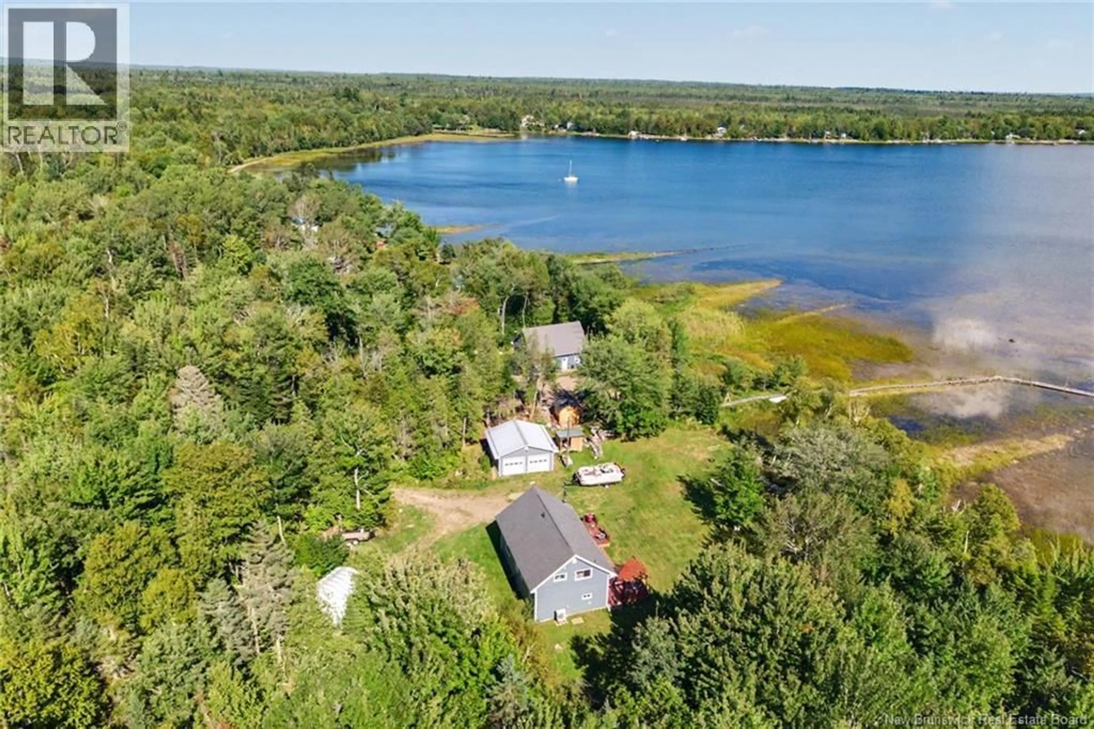 A pic from outside/outdoor area/front of a property/back of a property/a pic from drone, water/lake/river/ocean view for 103 LANE 4, Harvey New Brunswick E6K3Z1