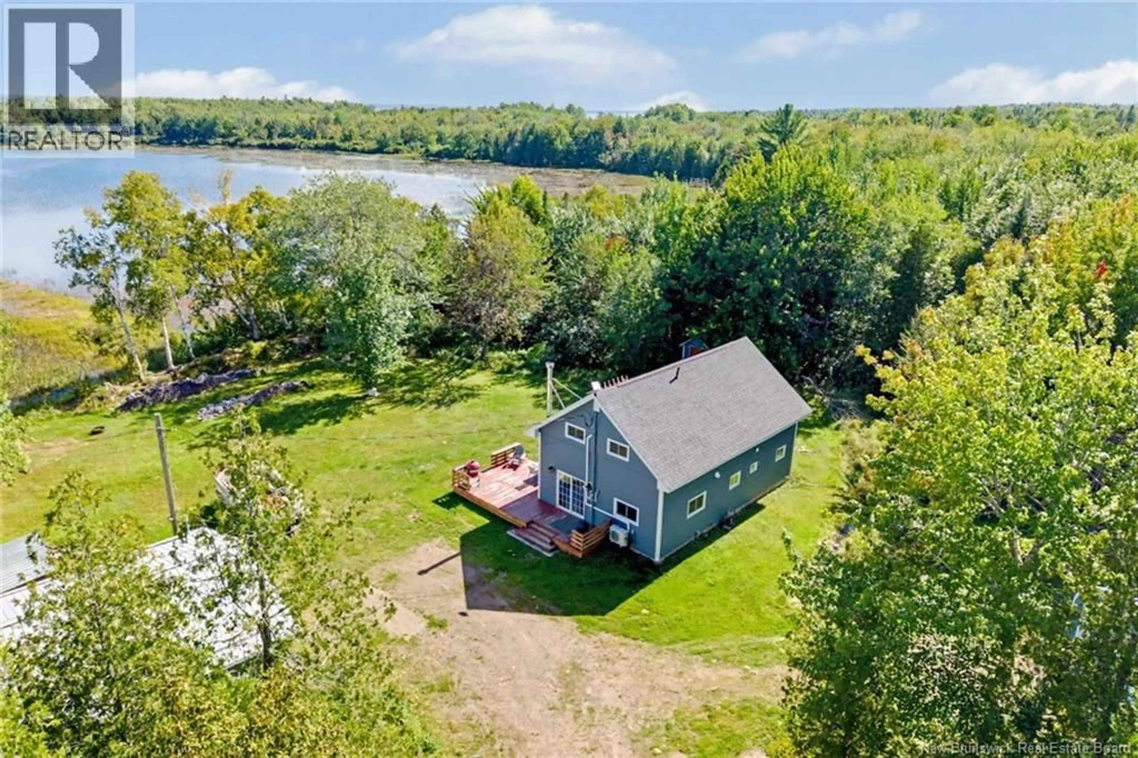 A pic from outside/outdoor area/front of a property/back of a property/a pic from drone, water/lake/river/ocean view for 103 LANE 4, Harvey New Brunswick E6K3Z1