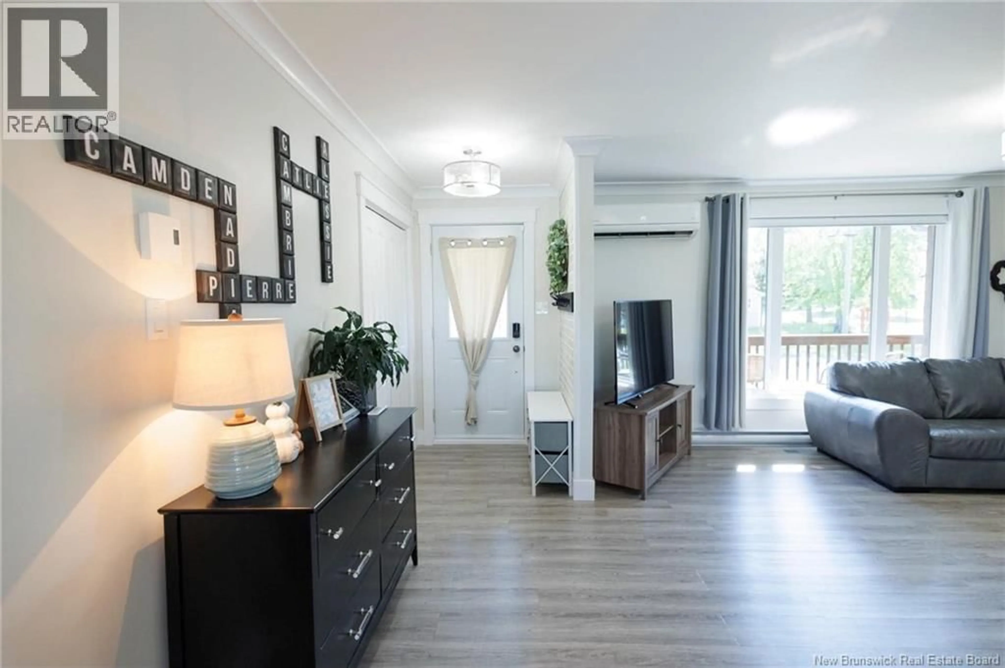 Living room with furniture, wood/laminate floor for 109 DES ERABLES ROAD, Drummond New Brunswick E3Y1R8
