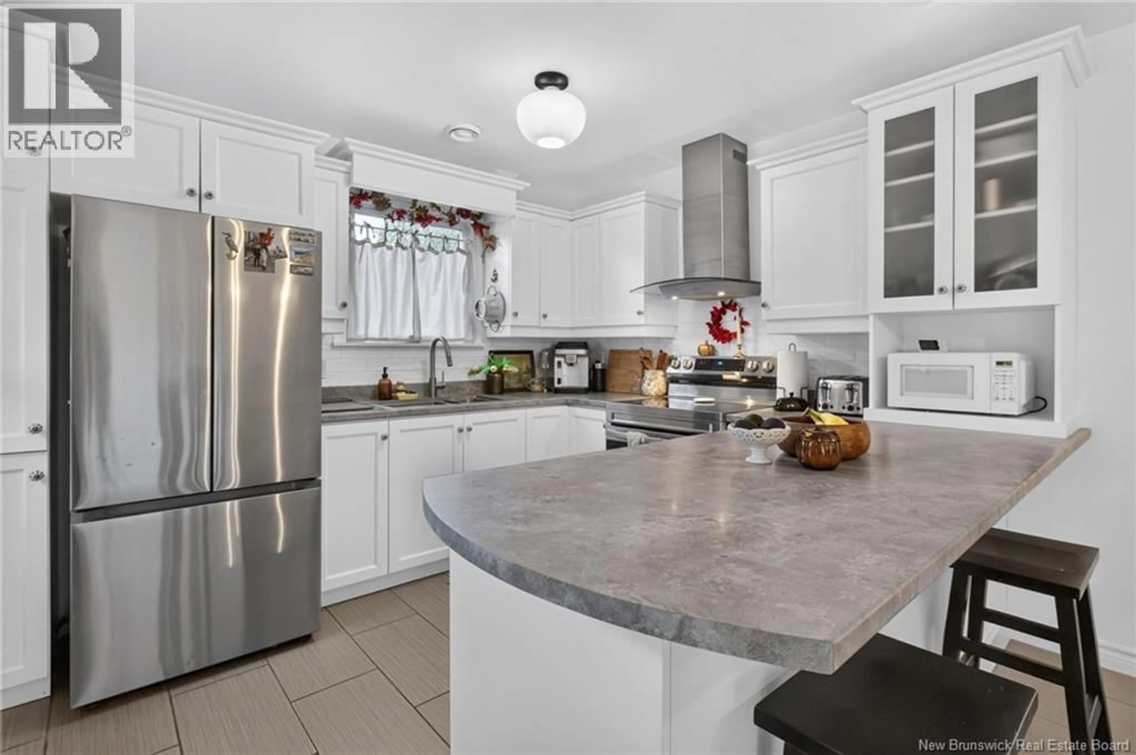 Open concept kitchen, ceramic/tile floor for 453 ACADIE, Shediac New Brunswick E4P1C4