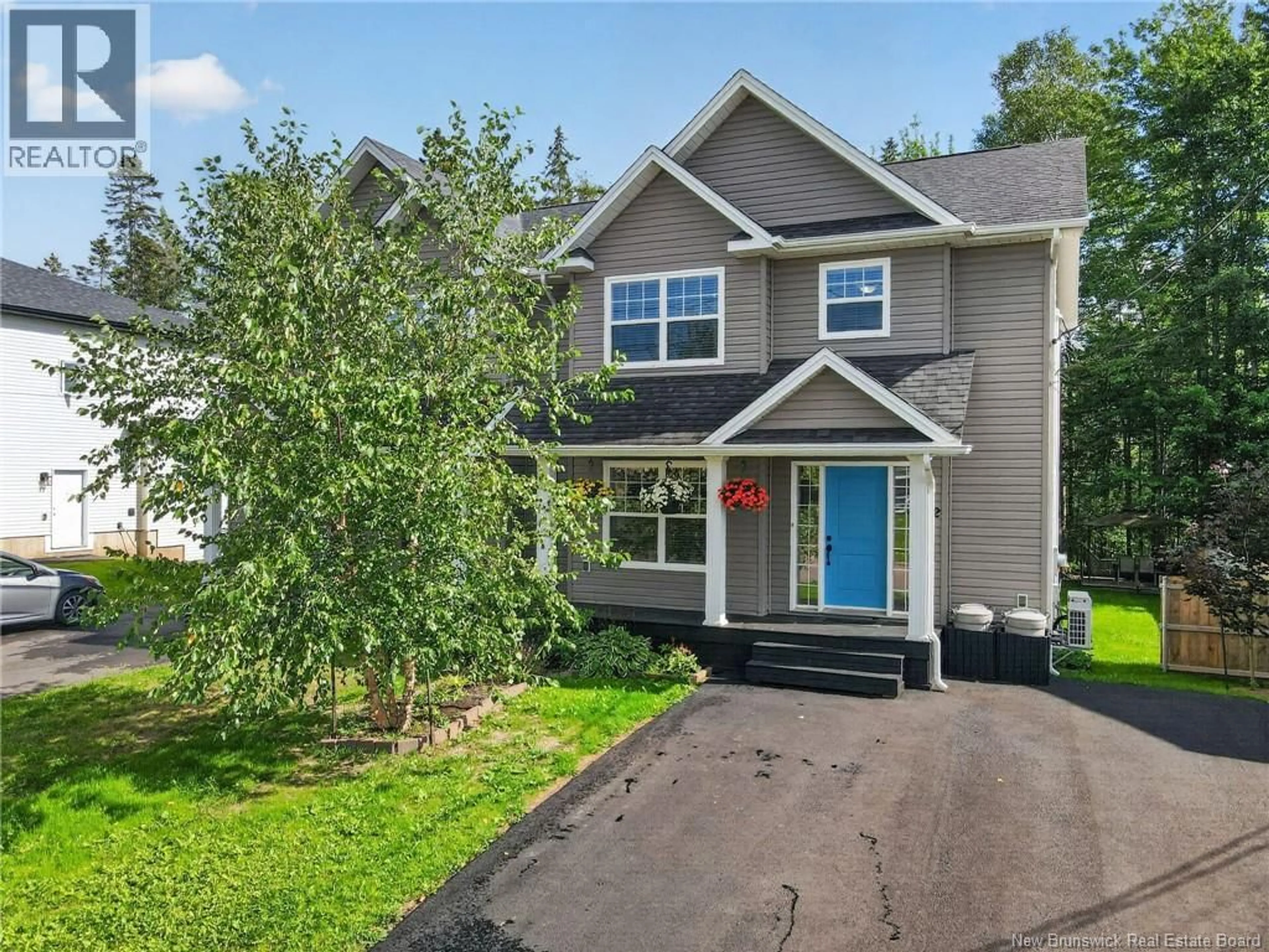 Home with vinyl exterior material, street for 302 LADY RUSSELL, Moncton New Brunswick E1E0G1